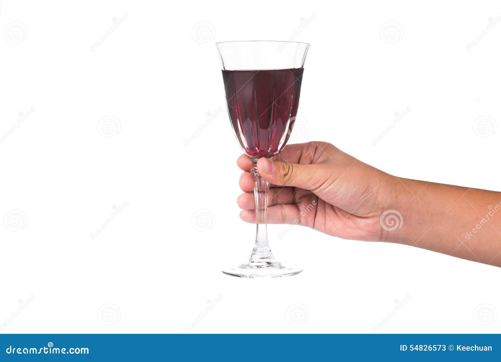 Hand Holding Red Wine in Crystal Glass Ready To Toast Stock Image