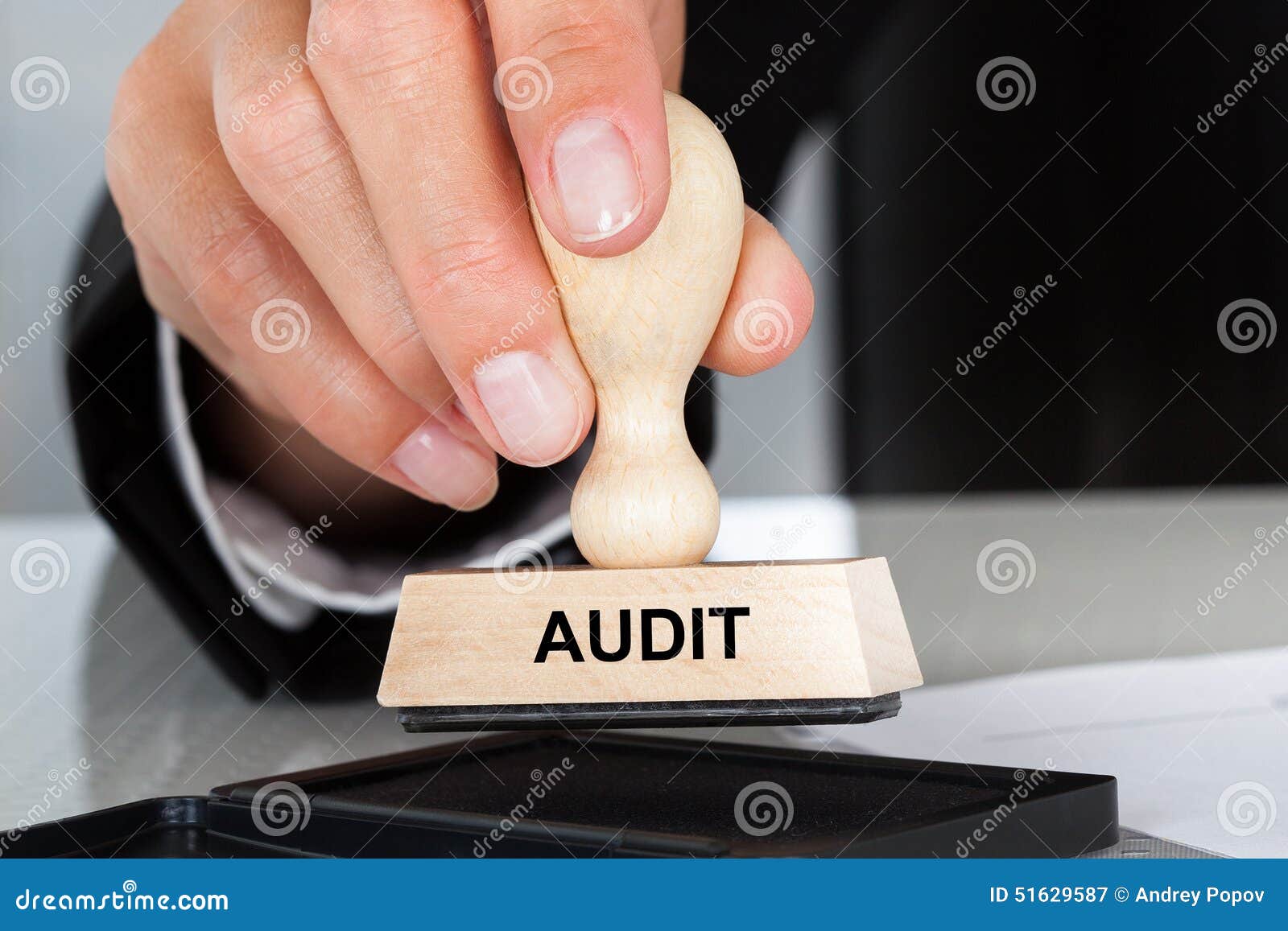 Hand Holding Rubber Stamp with Audit Sign Stock Image Image of