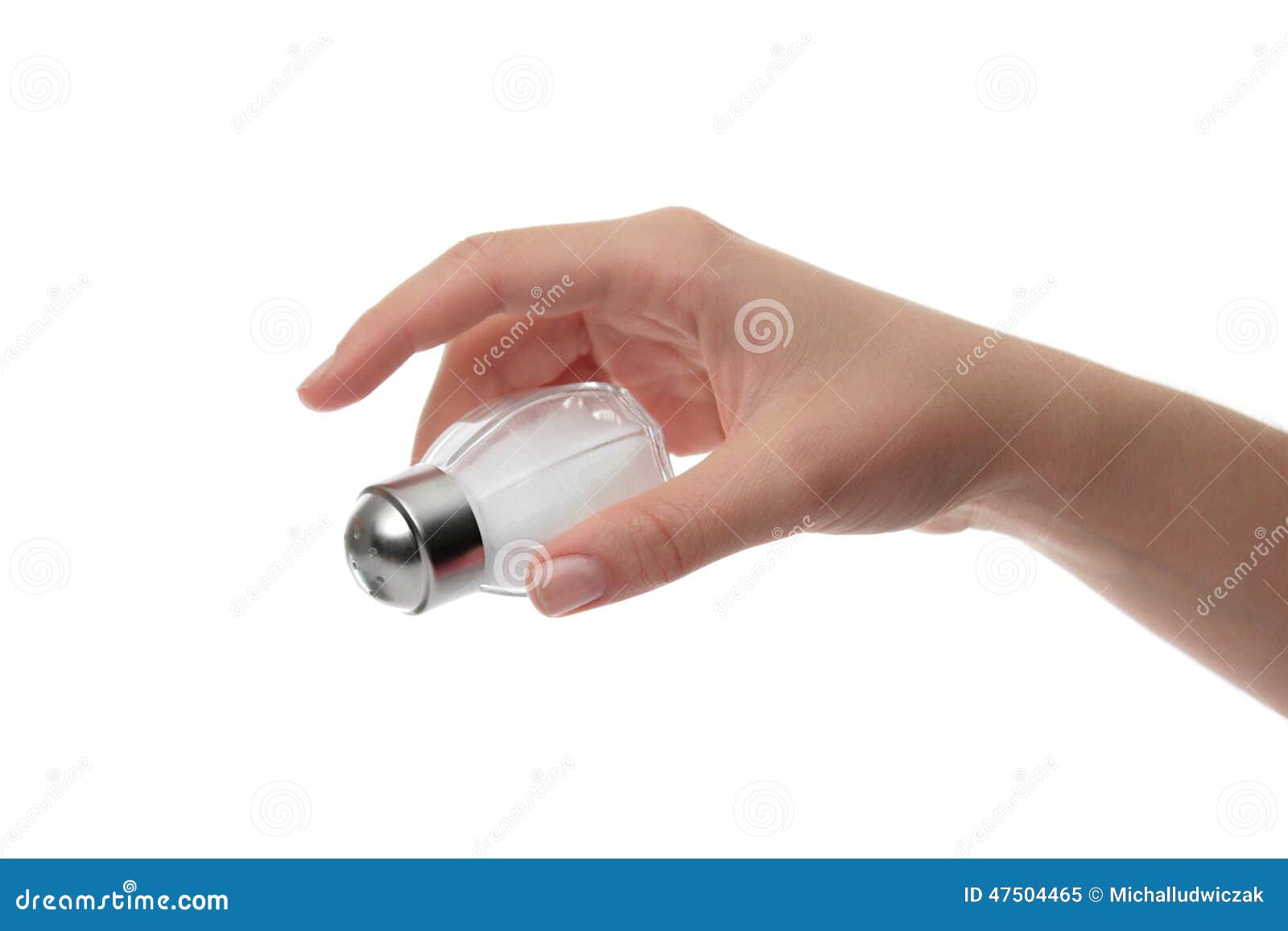 Hand holding a salt shaker stock image. Image of white 47504465