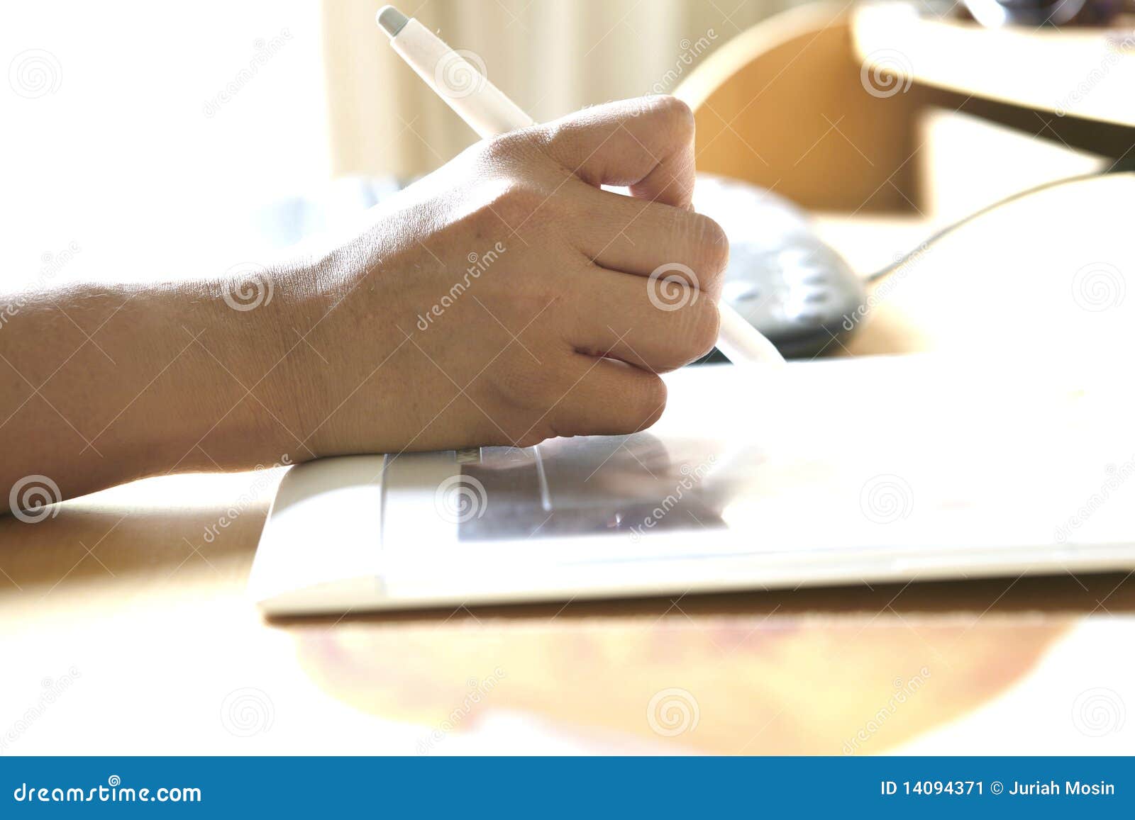 hand holding stylus pen