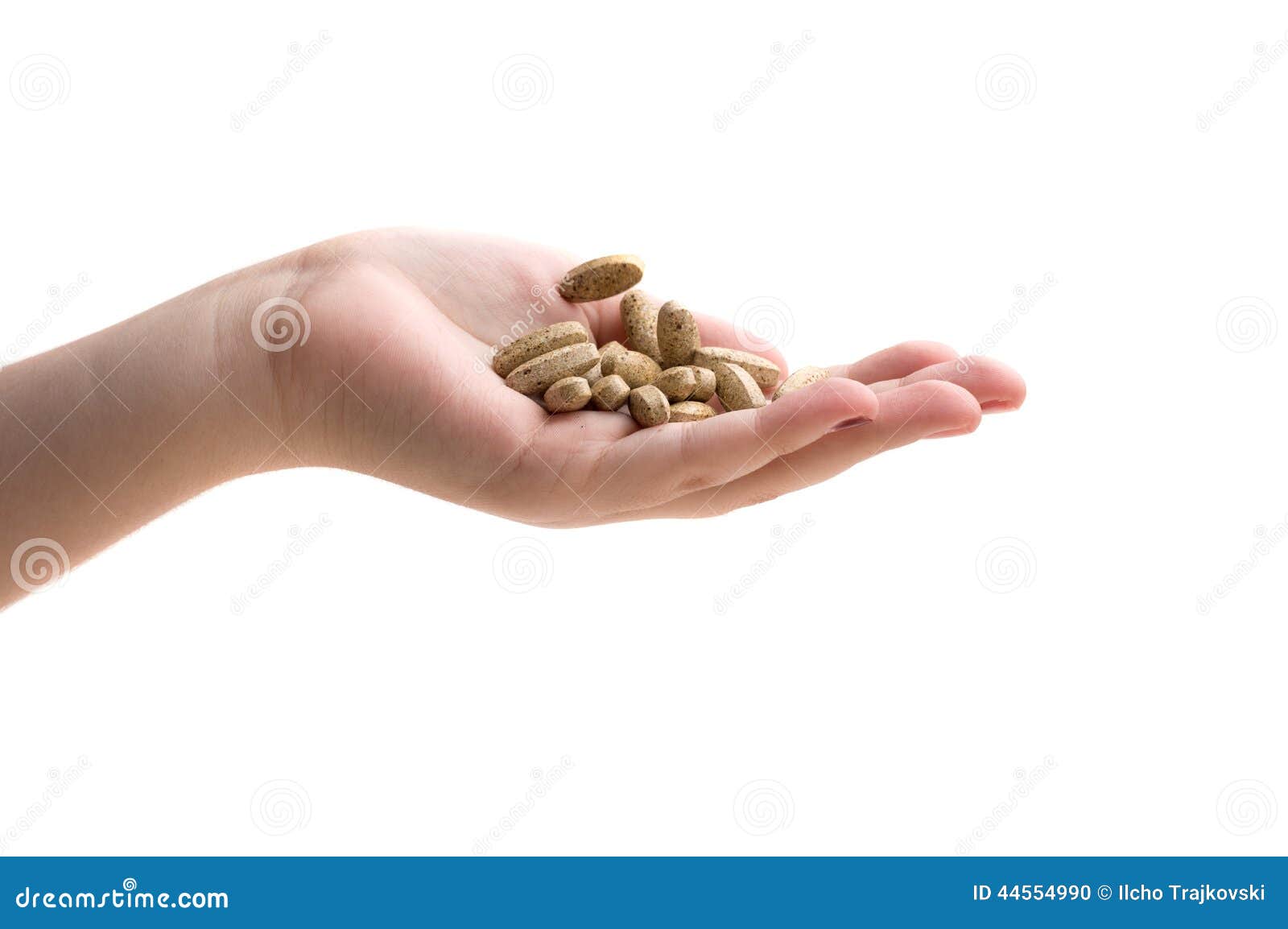 Hand Holding Supplements or Vitamins Stock Photo Image of isolated
