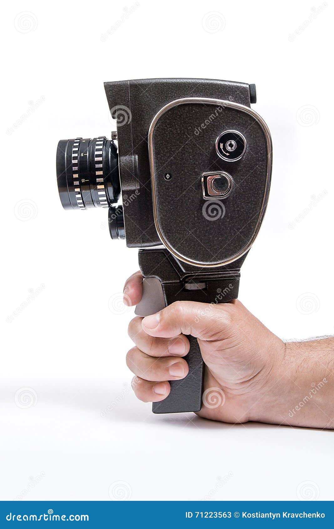 Hand Holding a Vintage Movie Camera Isolated on White Stock Image
