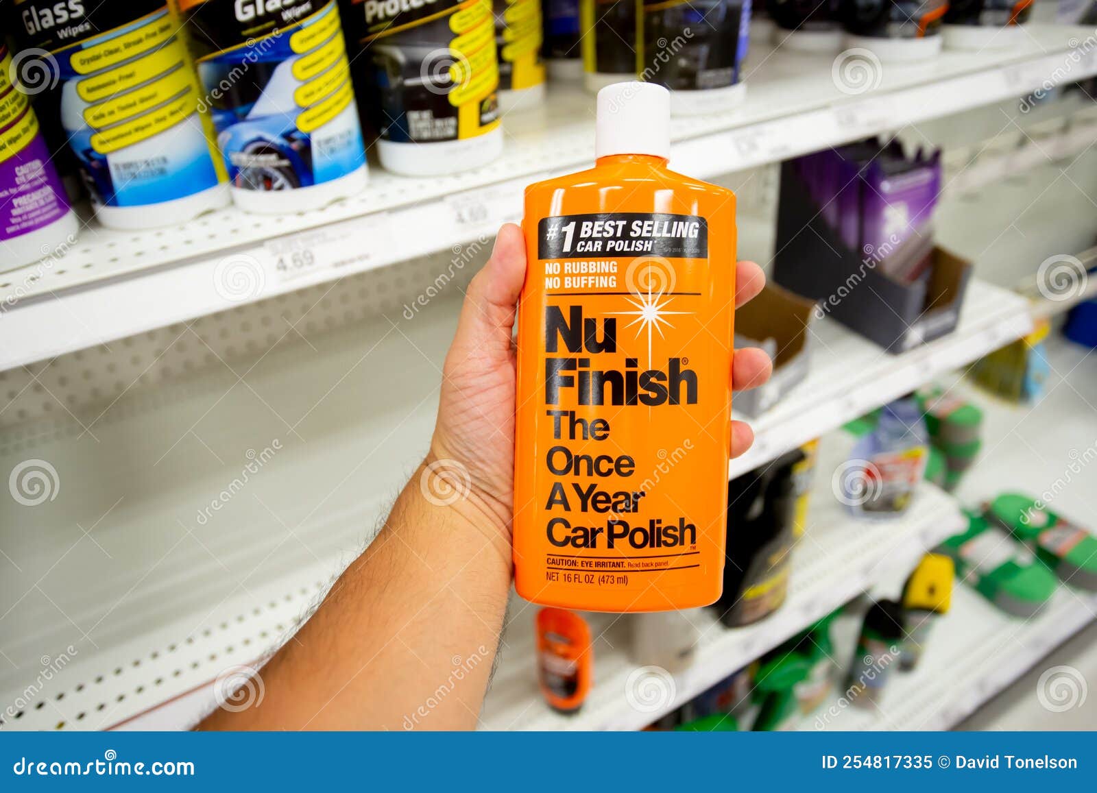 Hand Holds Nu Finish Car Polish Product at Store Editorial Image - Image of  foam, vehicle: 254817335