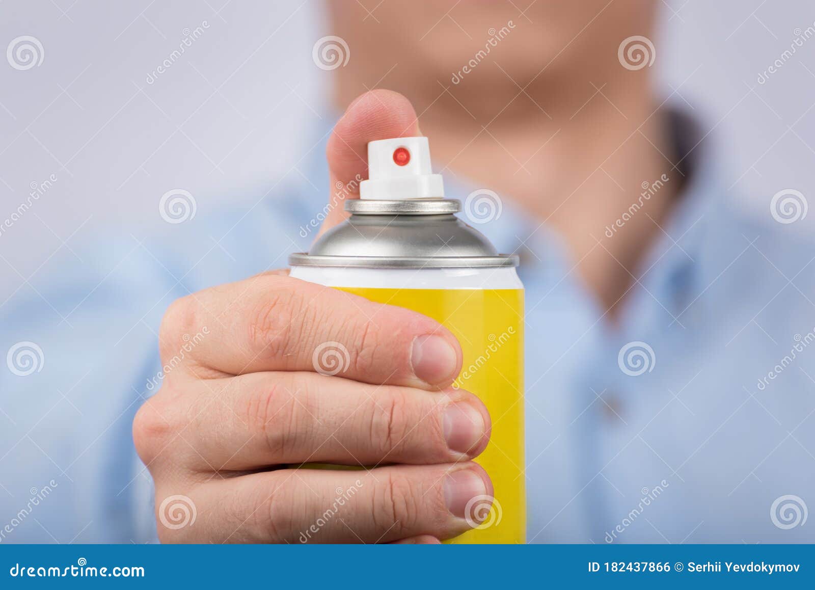Hand Holds Yellow Spray Bottle. Close Up Stock Photo Image of male