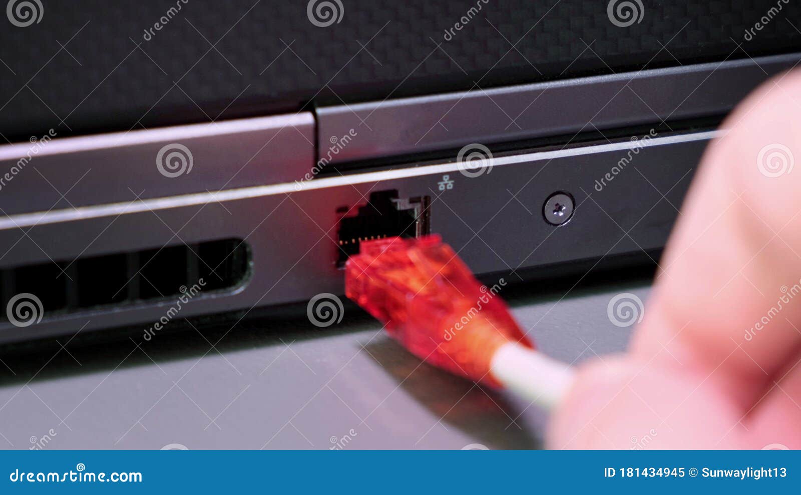 Hand Insert Cable RJ 45 Connections To Laptop. Stock Image