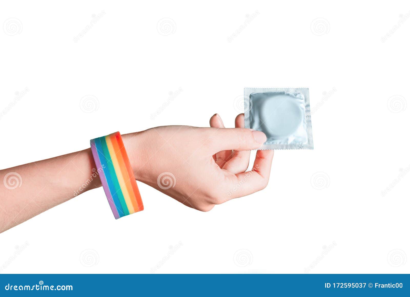 Hand with LGBT Bracelet Holding a Condom Stock Image pic