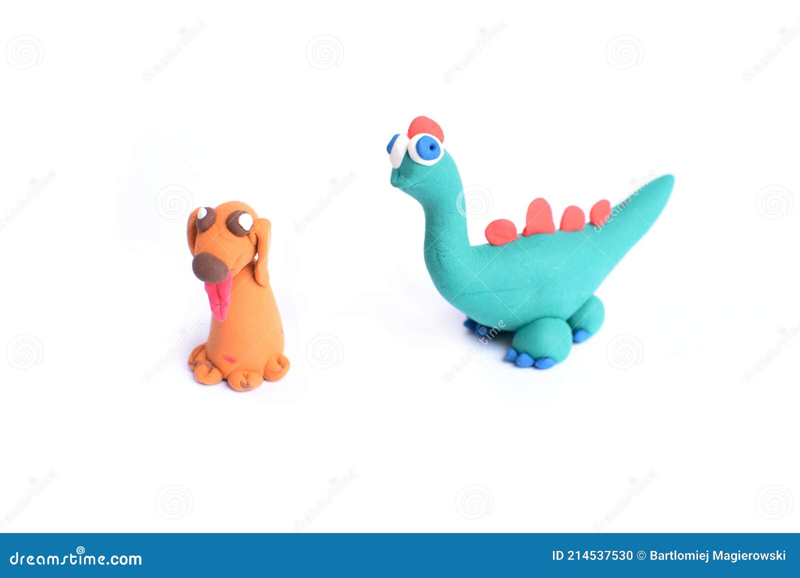 orange dog and green dinosaur made of clay