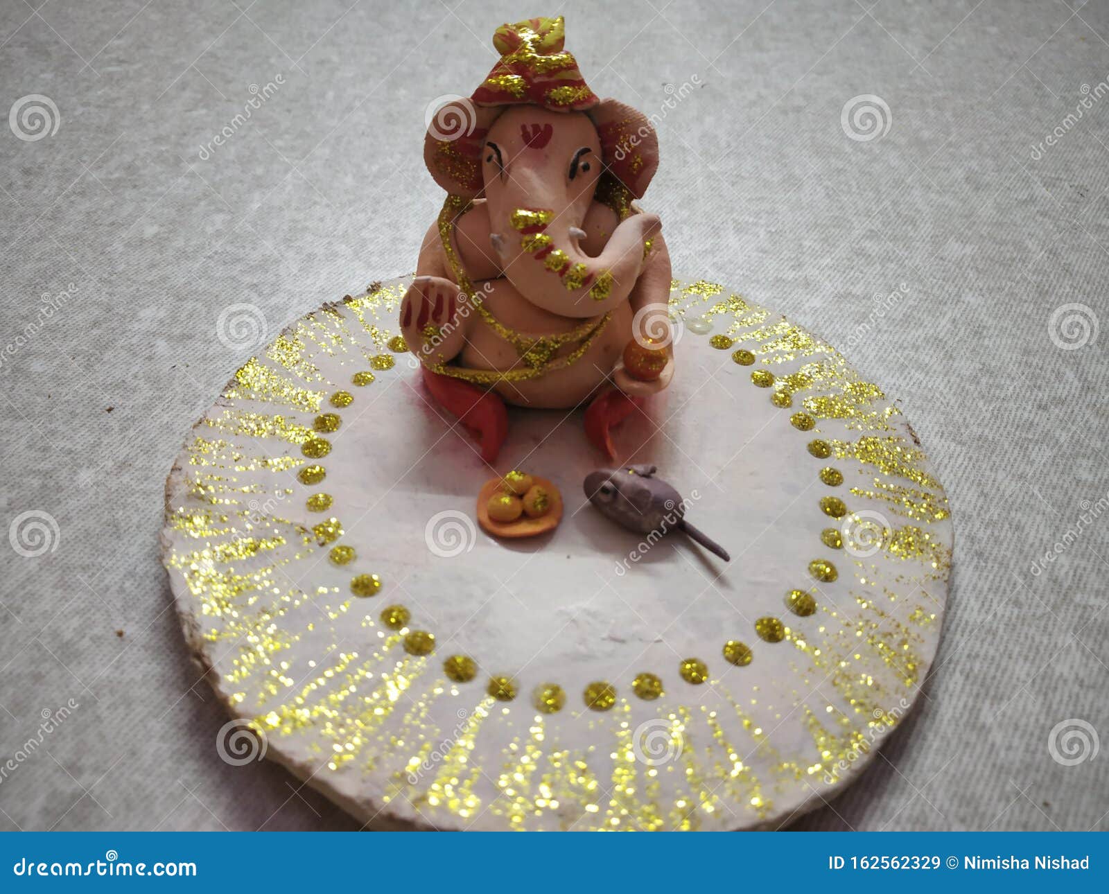 hand made ganpati ji with mouse and lado