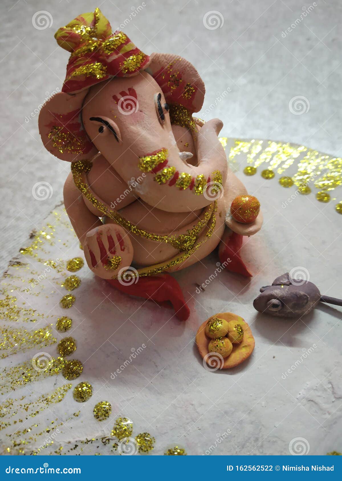 hand made ganpati ji with mouse and lado