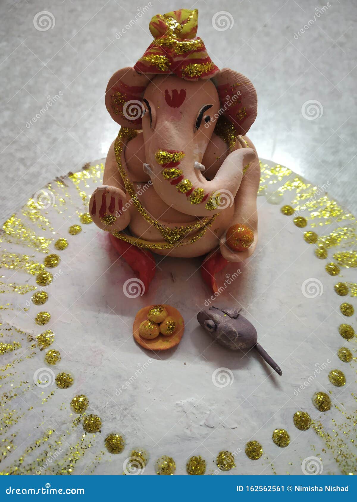 hand made ganpati ji with mouse and lado