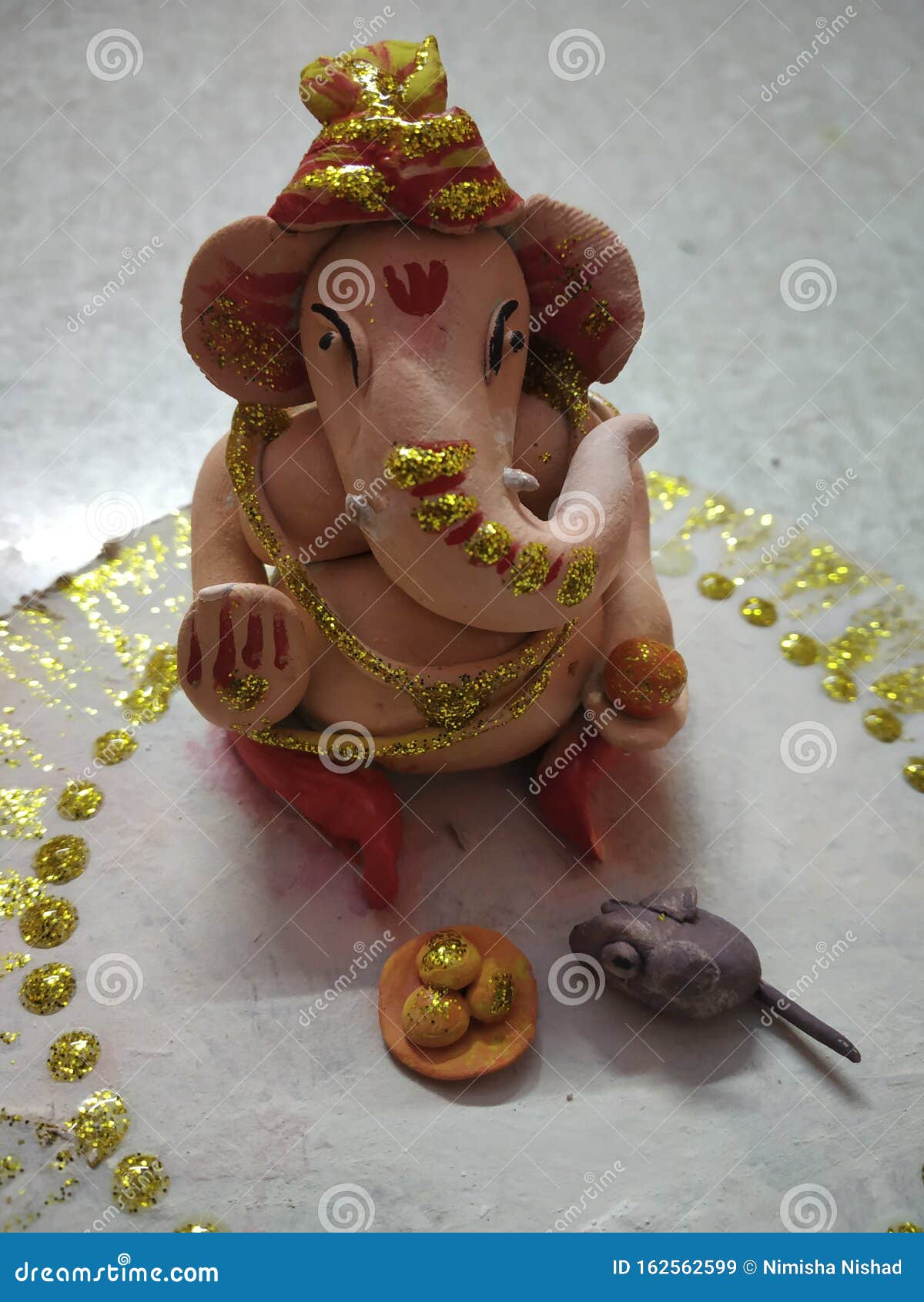 hand made ganpati ji with mouse and lado