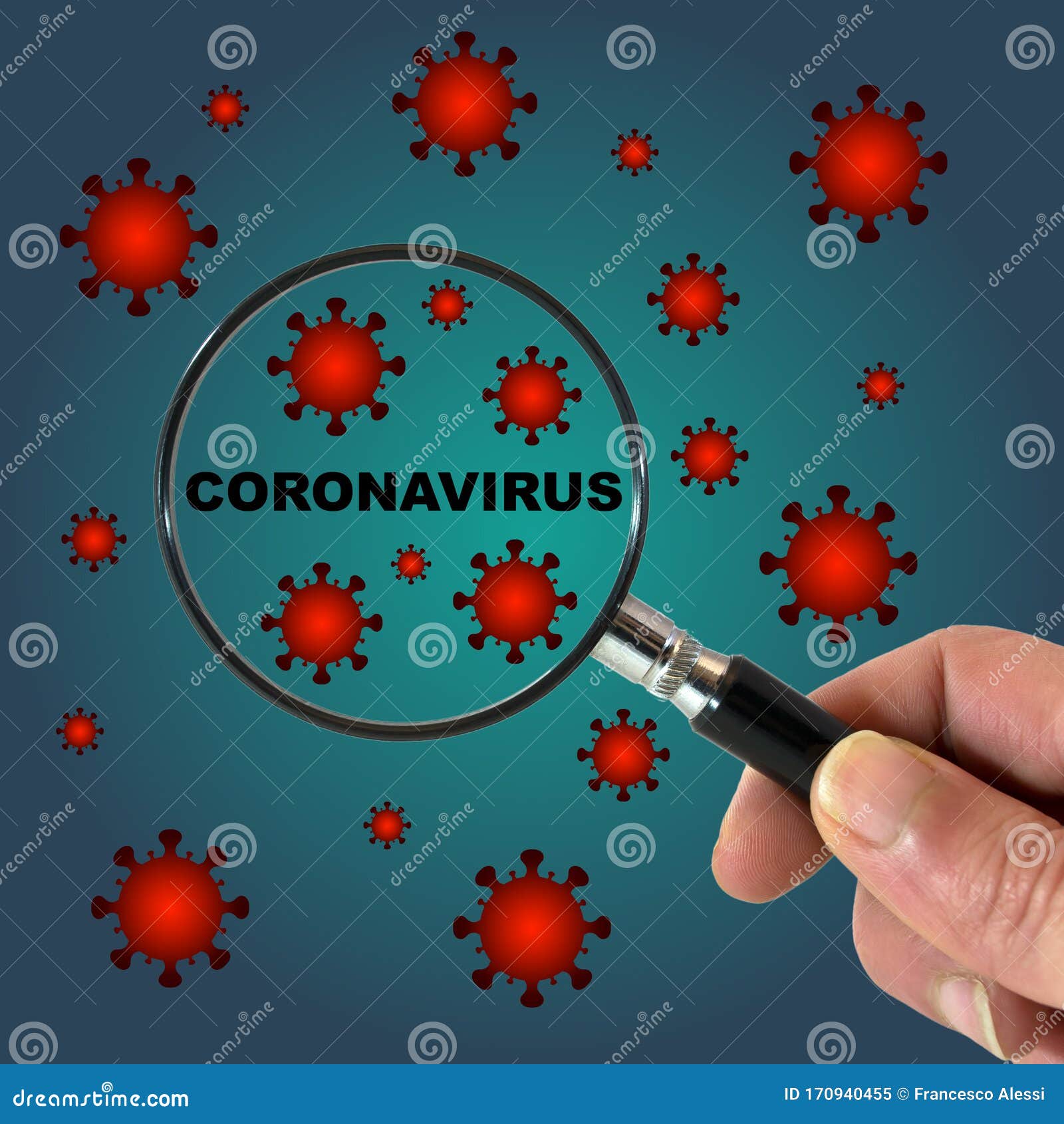 hand with magnifying glass over coronavirus word
