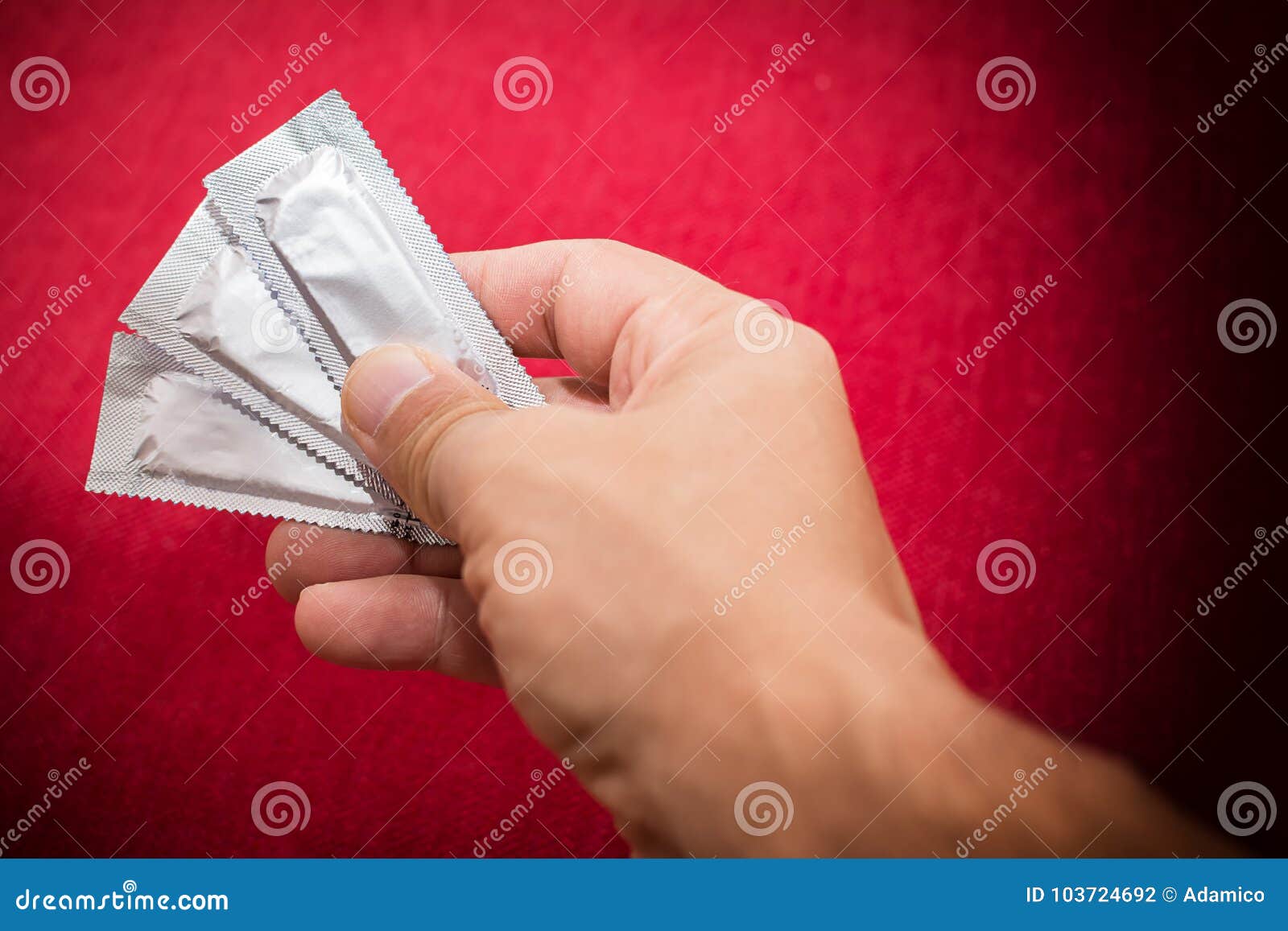 Hand of Man Carrying a Condom Stock Photo Image of carrying