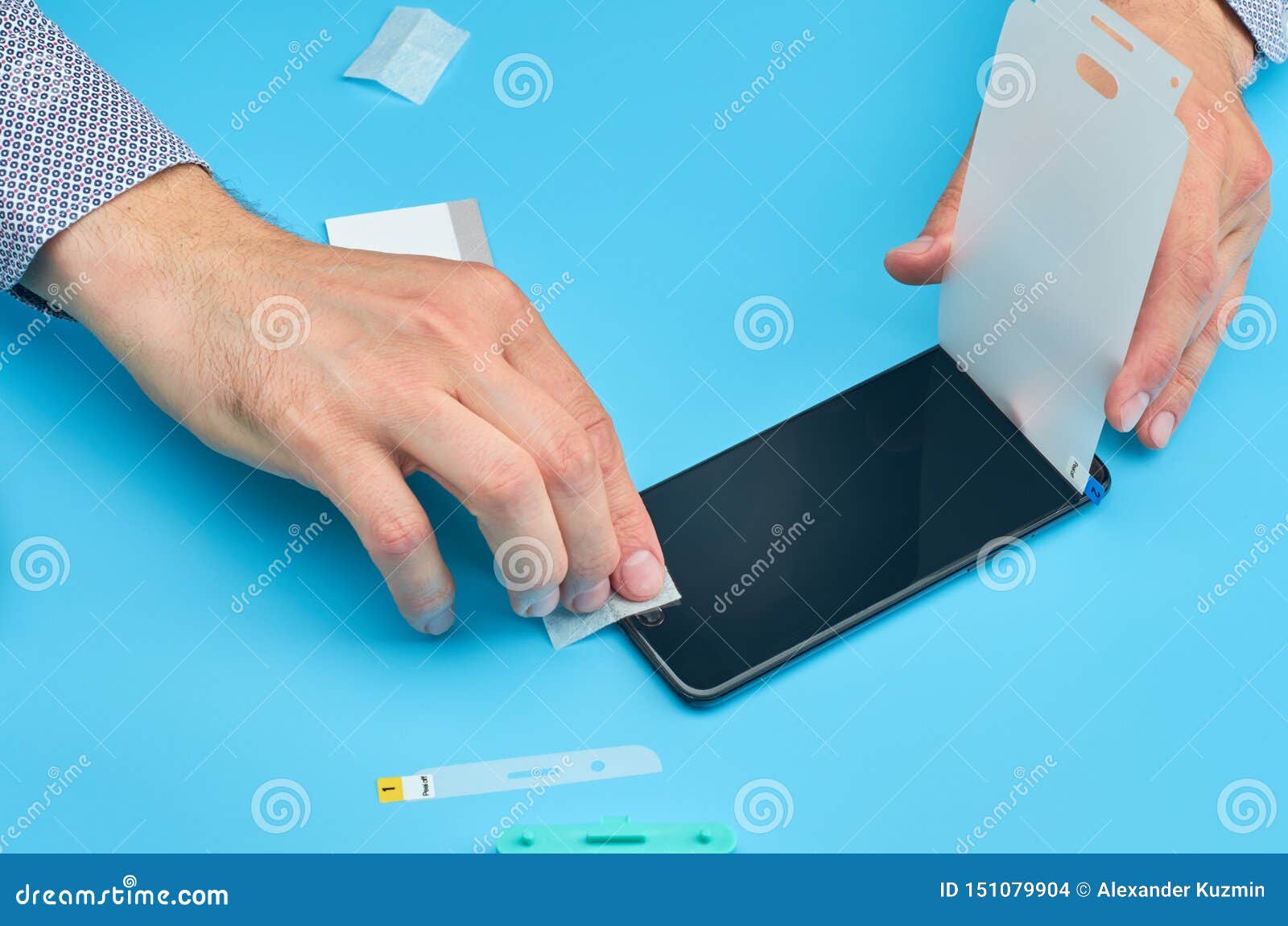 The Man Replacing the Broken Tempered Glass Screen Protector for
