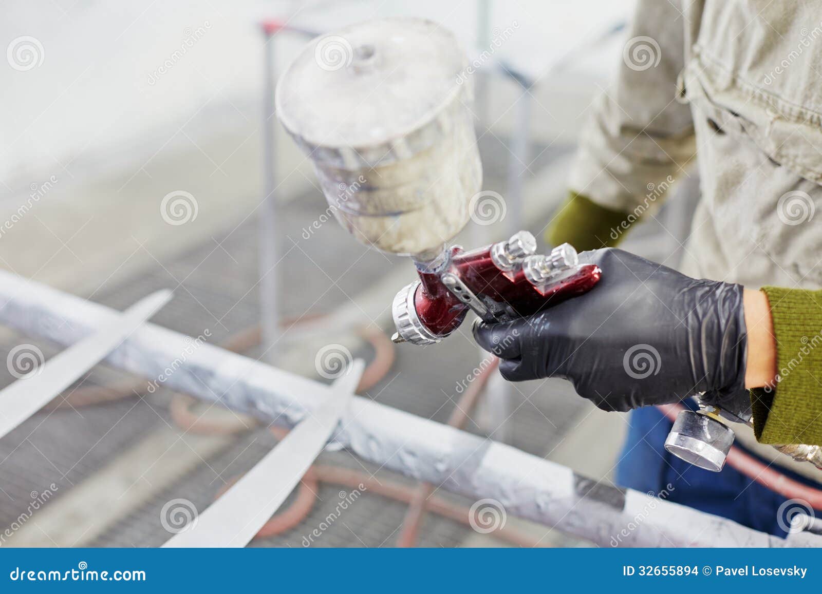 Hand Of Man With Spray Paint Gun, Painting Car Details