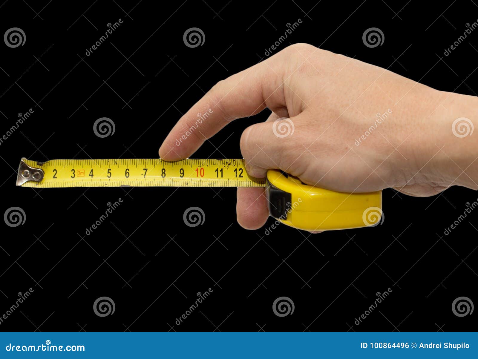 Hand with Measuring Tool Completely Isolated on Black Stock Photo