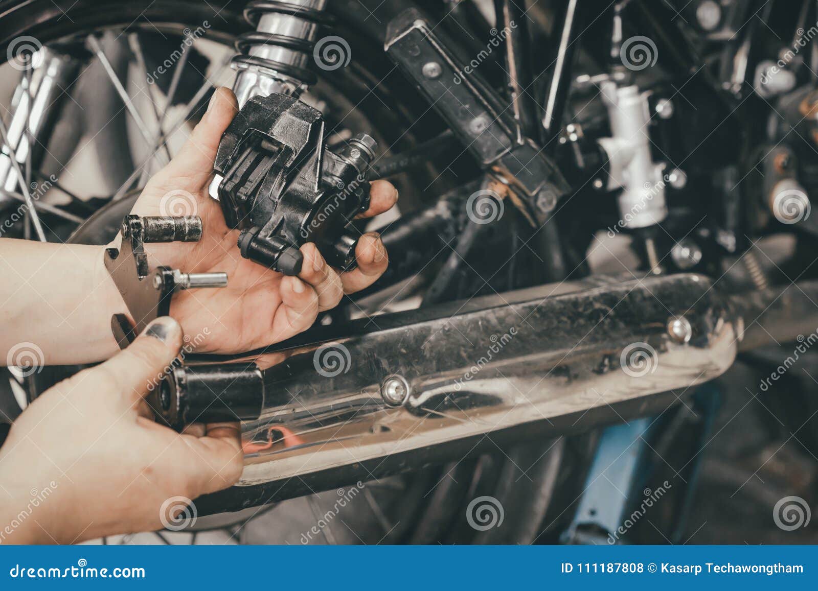 Hand of Mechanic Man Replace and Adjust Motorcycle Rear Brake System Stock Photo Image of auto