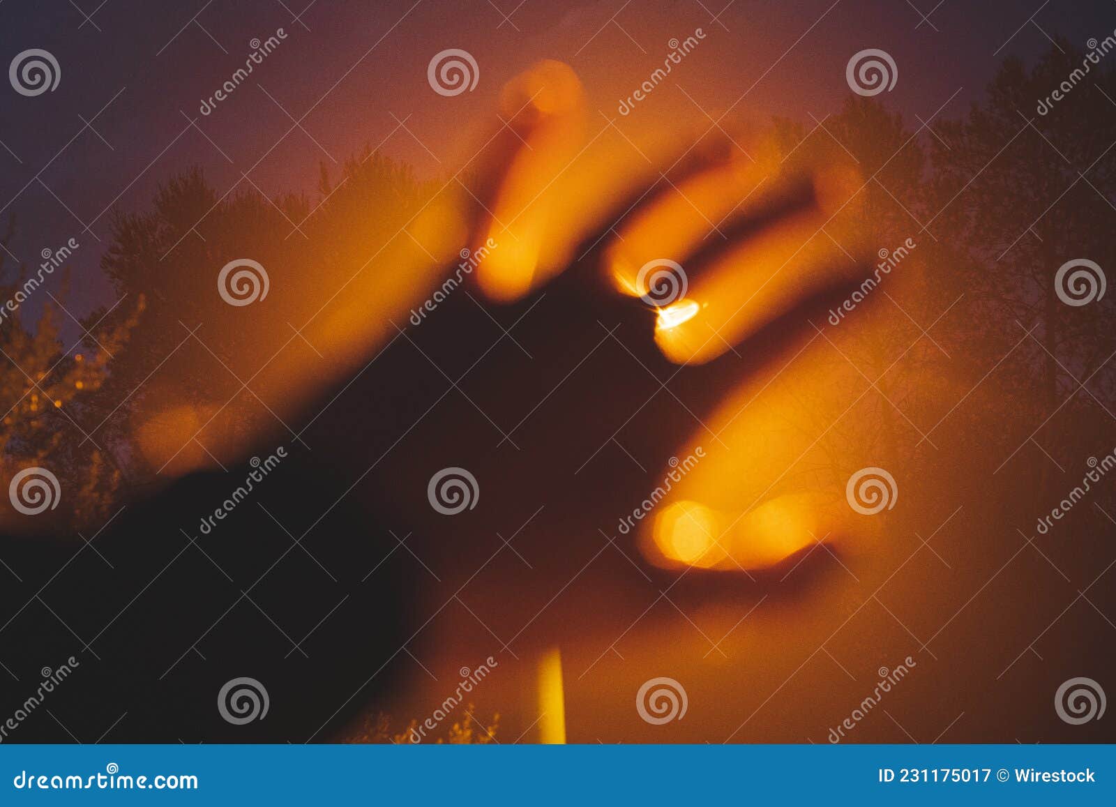 hand in the middle of the light