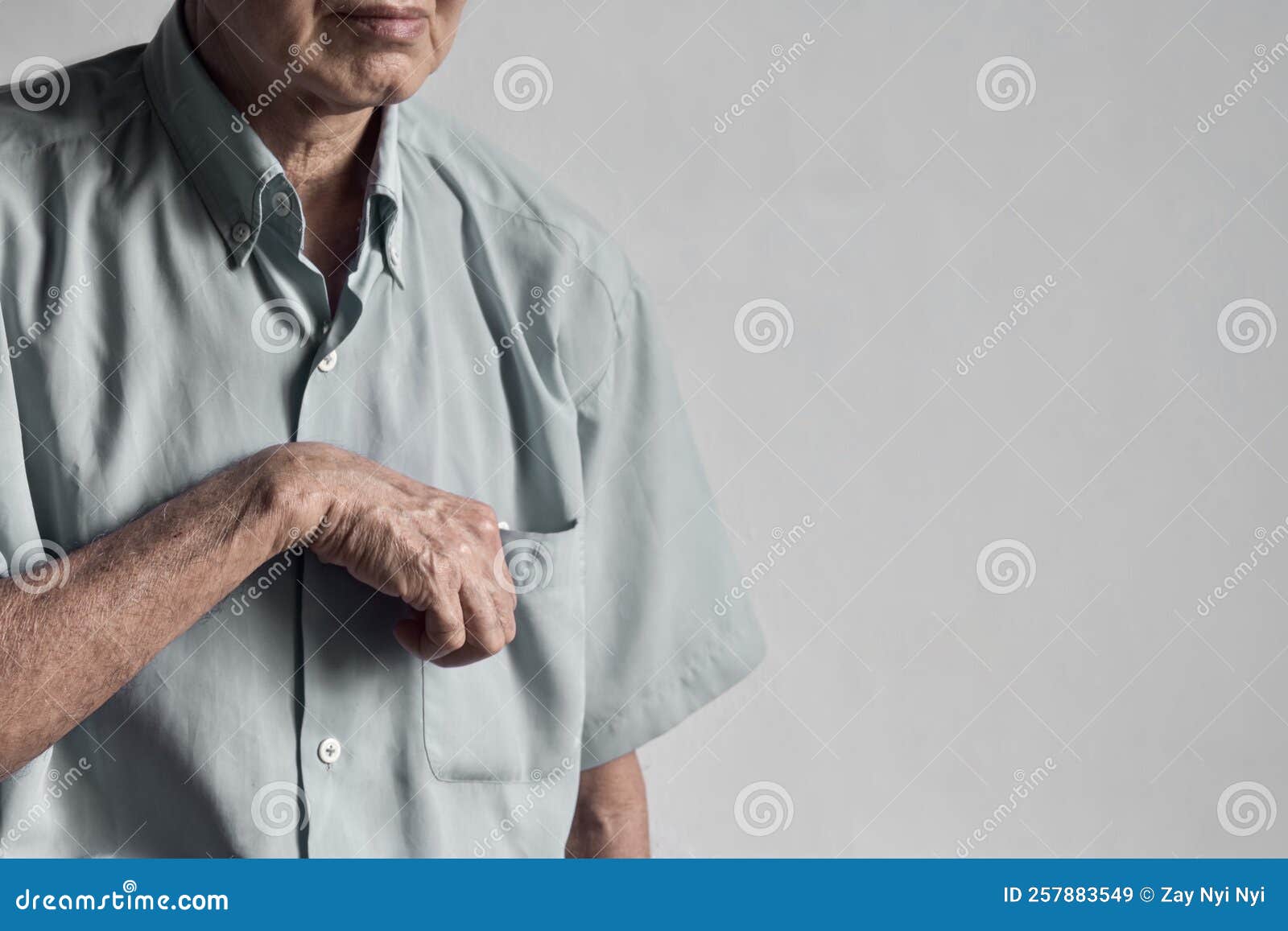 hand muscle rigidity and finger flexion of asian man
