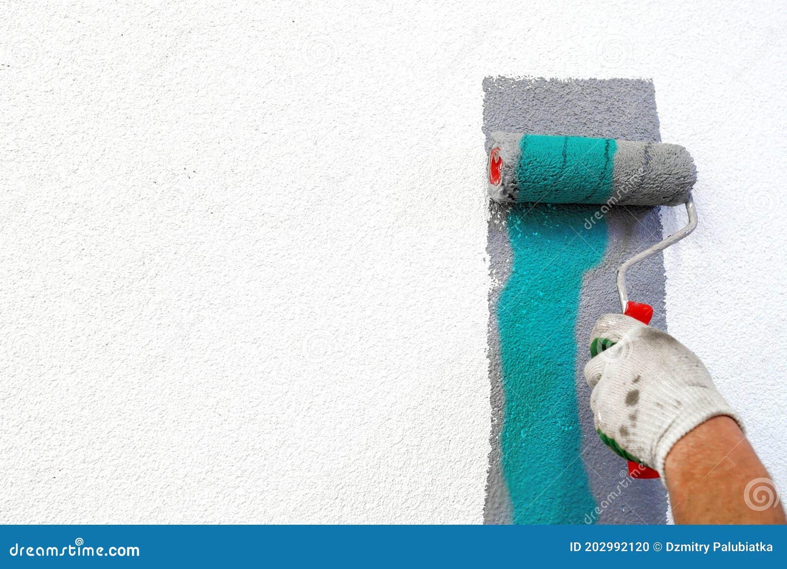 Hand with Paint Roller in Hand, Painting a Wall Stock Photo Image of