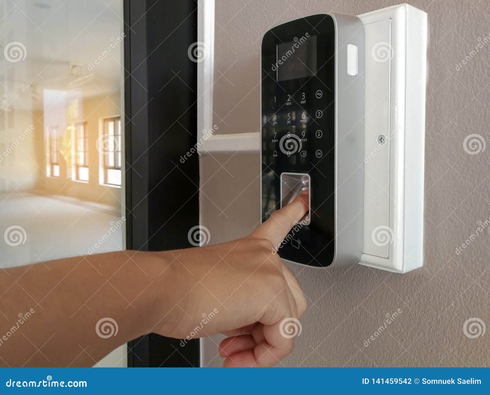 The Hand Of People And Electronic Digital Door Finger Print Scan
