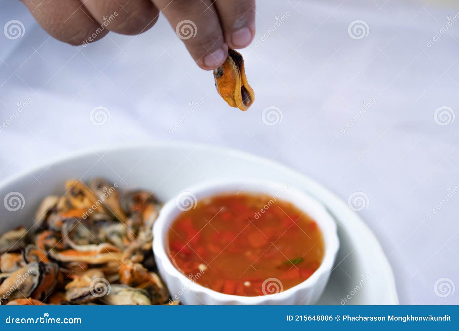 Hand Picked Mussels Dipped in Seafood Sauce Stock Photo Image of