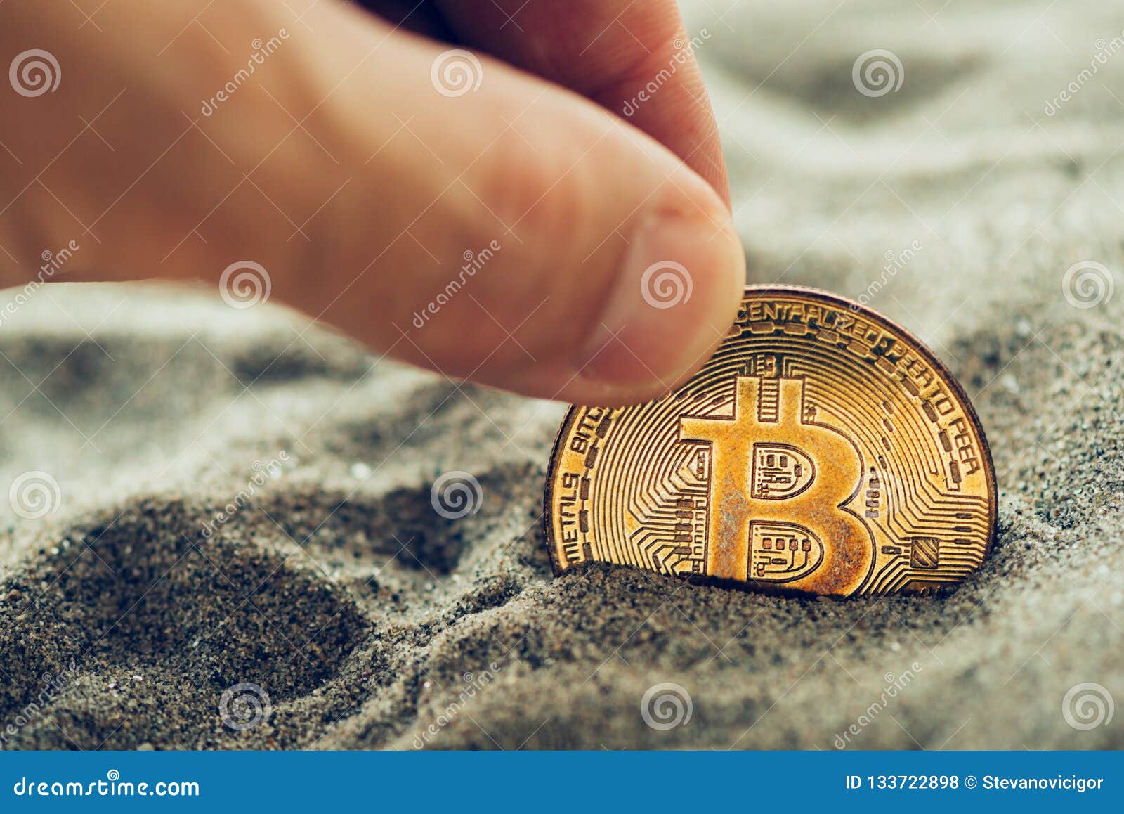 Hand Picking Single Bitcoin from Sand Stock Photo - Image of minimal,  modern: 133722898