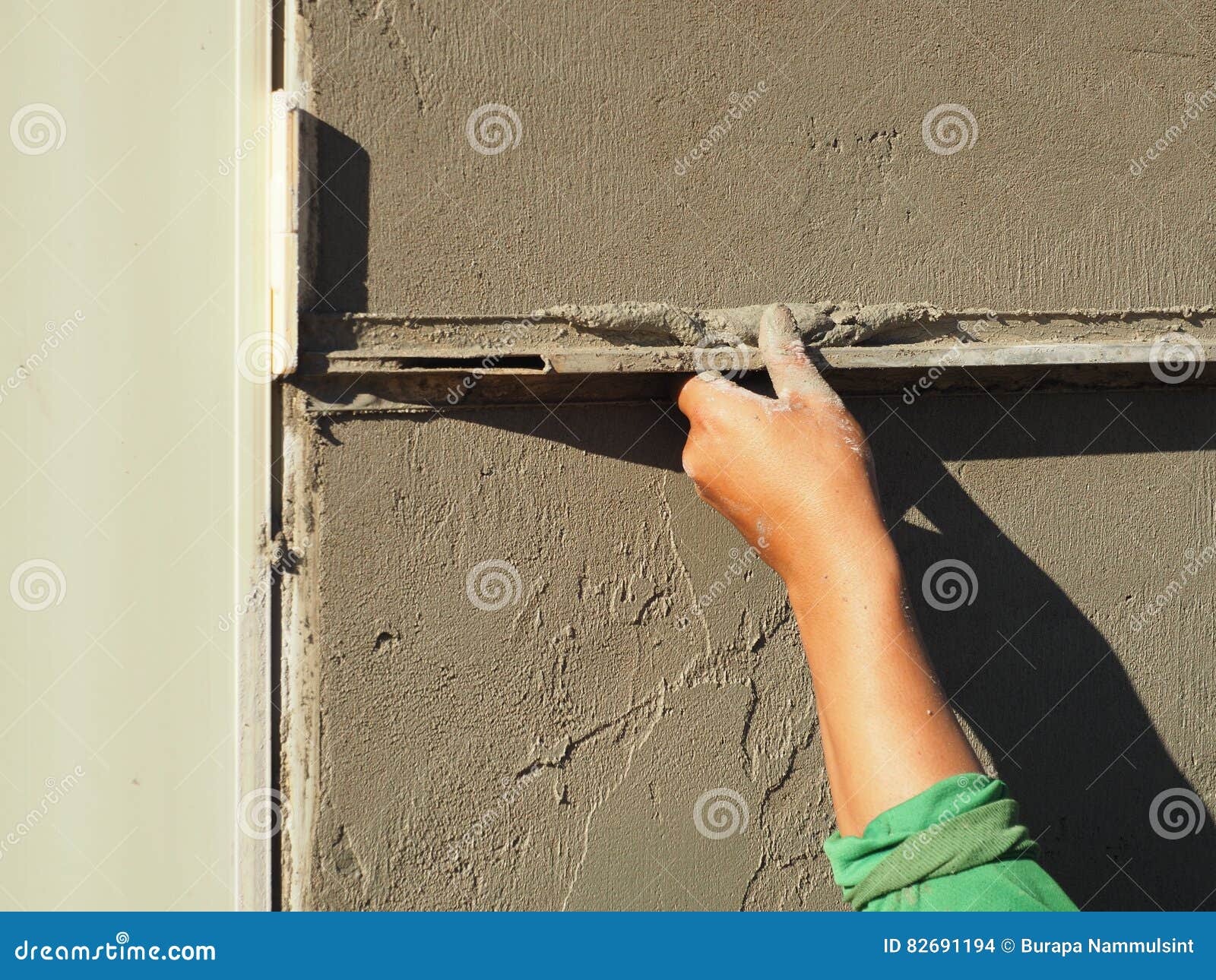 Hand Plastering Wall with Trowel. Stock Photo Image of cement, hand