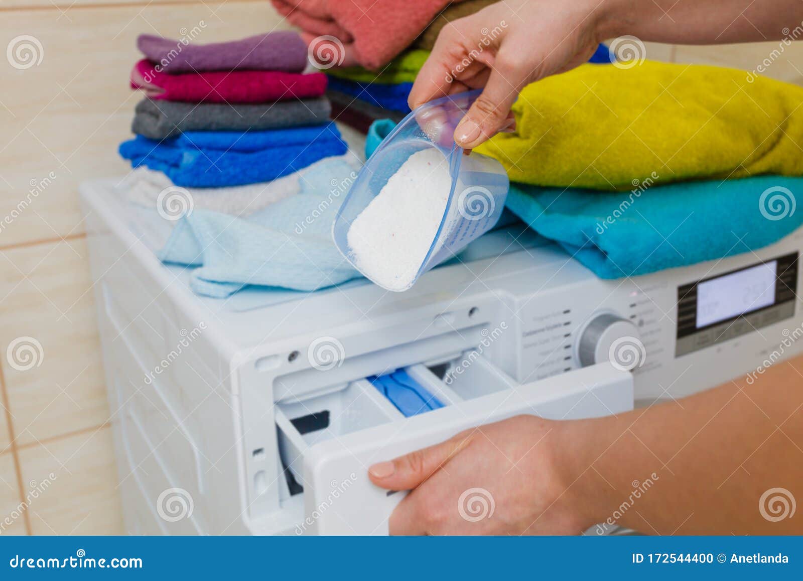 Hand Pour Washing Powder into Machine Stock Photo Image of laundry, powder 172544400