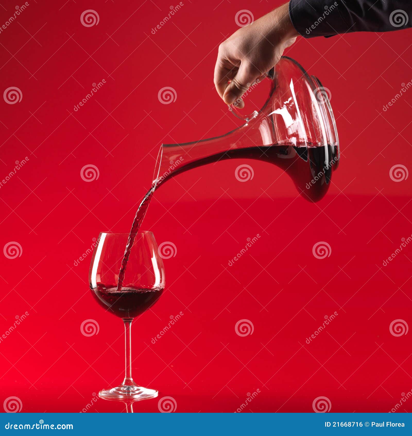 Hand Pouring Wine in Glass from Decater Stock Photo Image of label