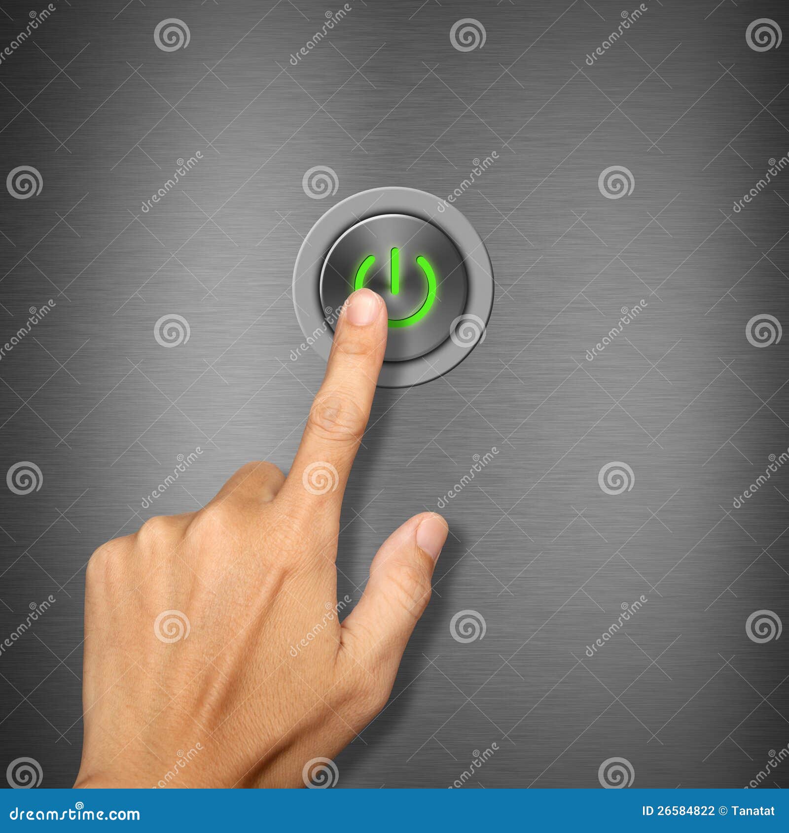 hand pressing power button on metalic background