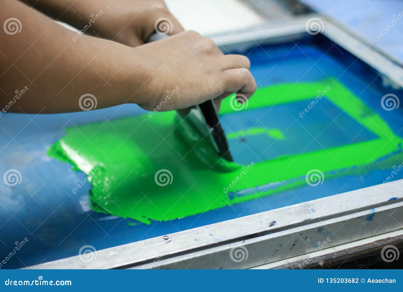 Hand Pressing Silkscreen Printing, Close Up View Stock Photo Image