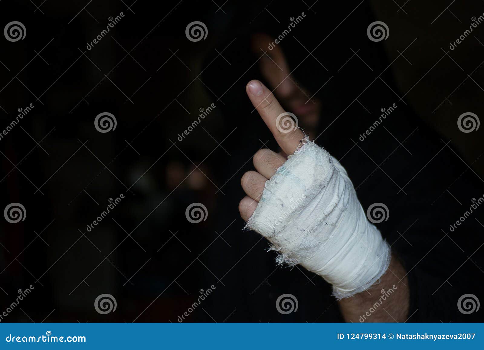 Close-up of Hands of Boxer with Bandage Ready for a Fight Against