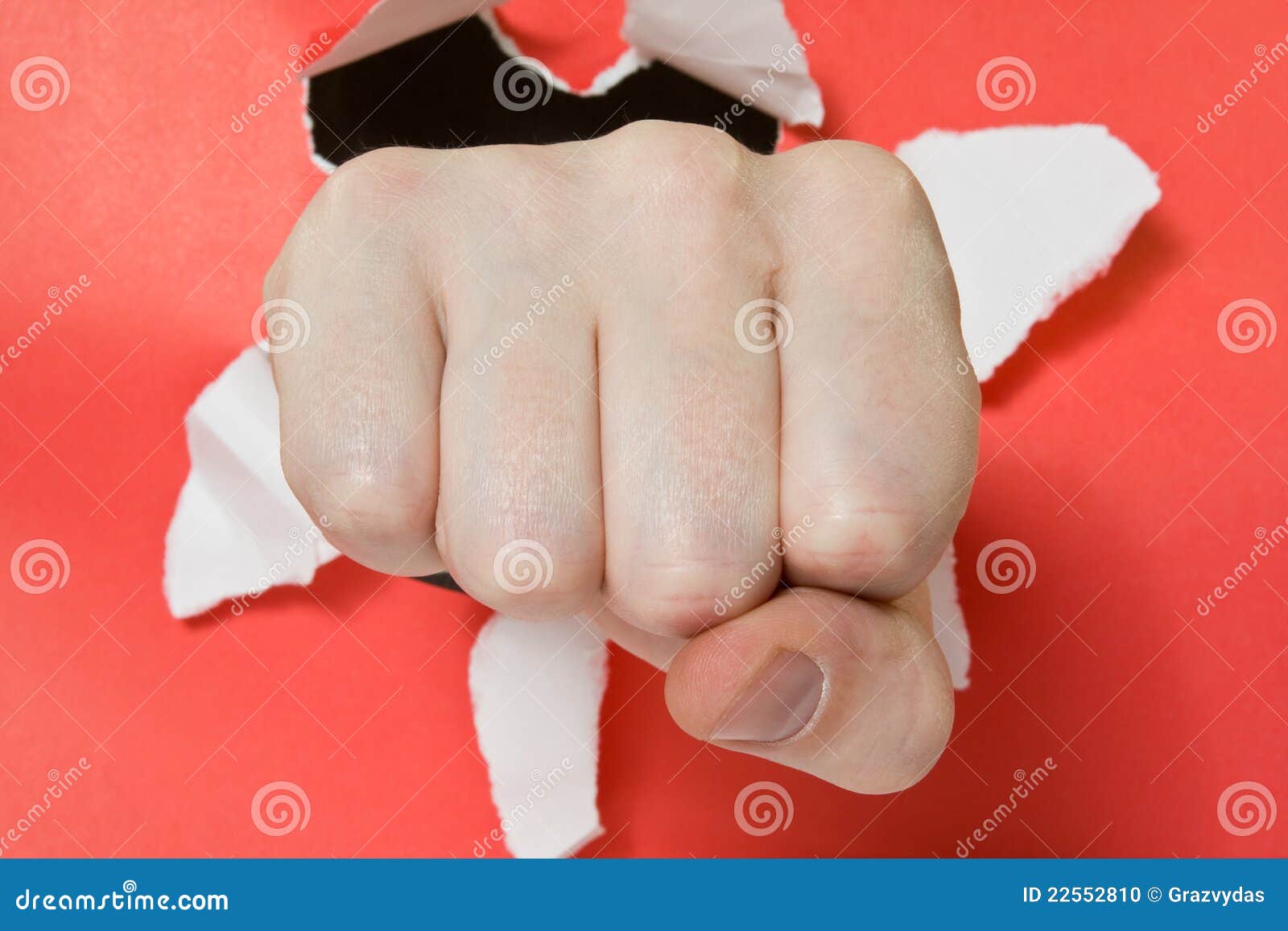Hand Punching through Red Paper Stock Photo Image of strike, angry 22552810