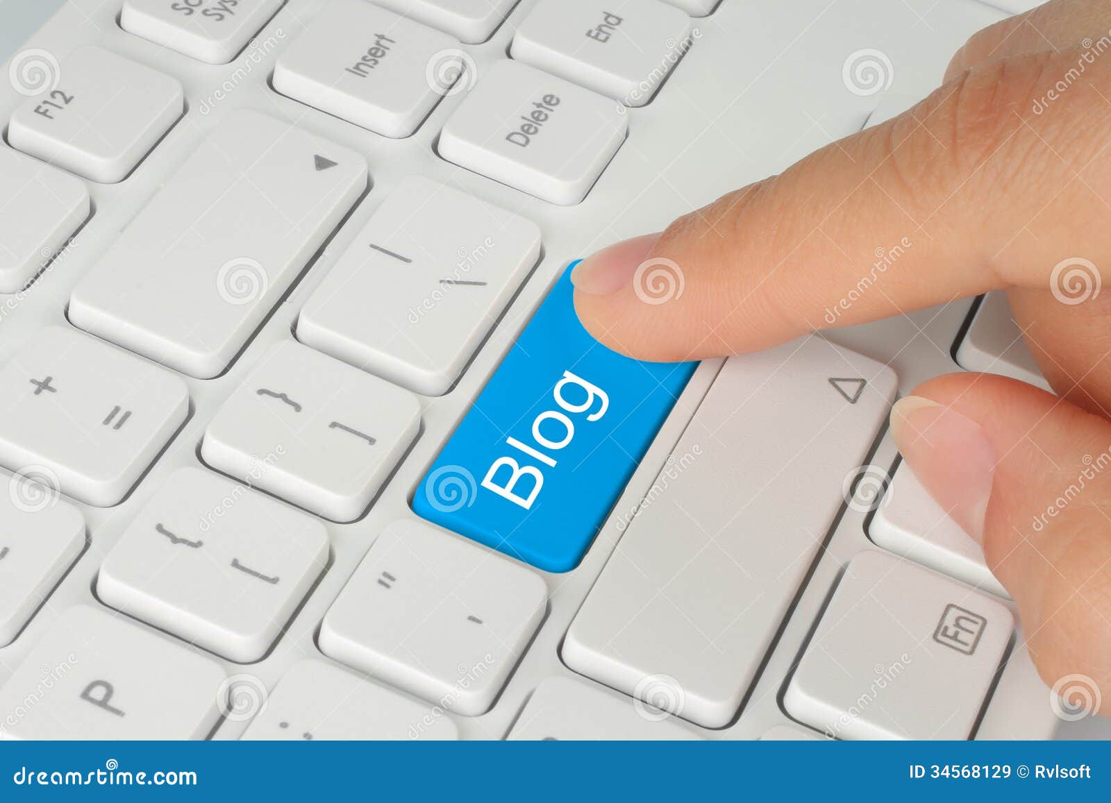 hand pushing blue blog button