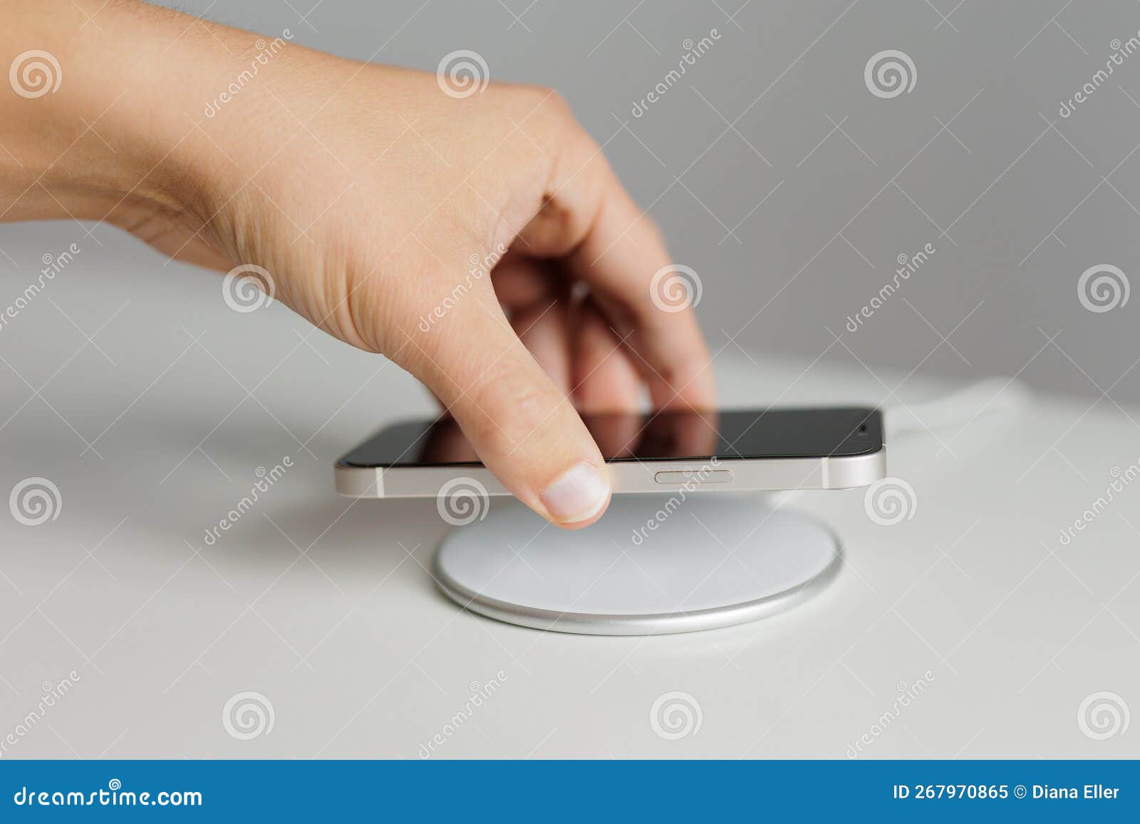 Hand Putting Mobile Phone on Wireless Charger Stock Image Image of
