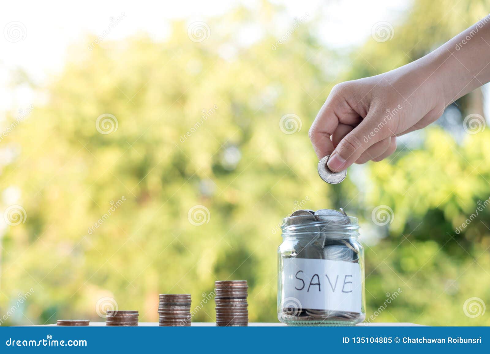 Hand Putting Money Coins Stack Growing, Saving Money for Purpose