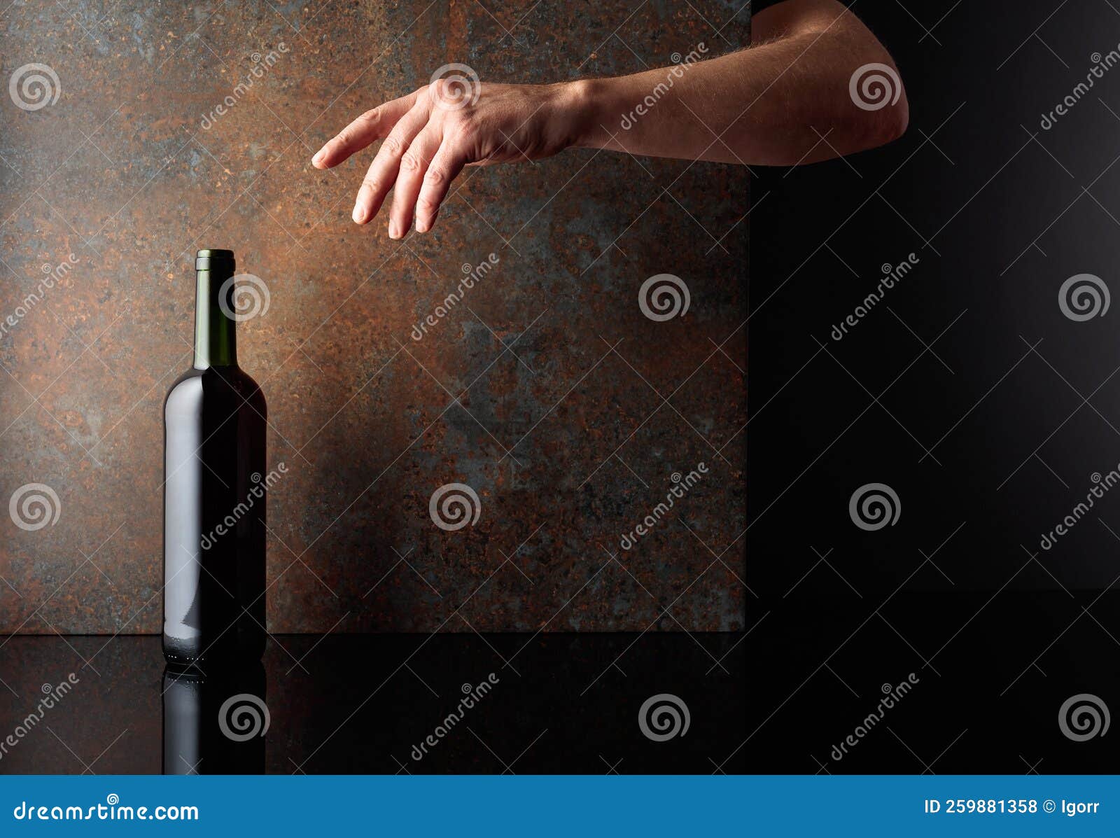 Hand Reaches for a Bottle of Red Wine Stock Photo Image of hand