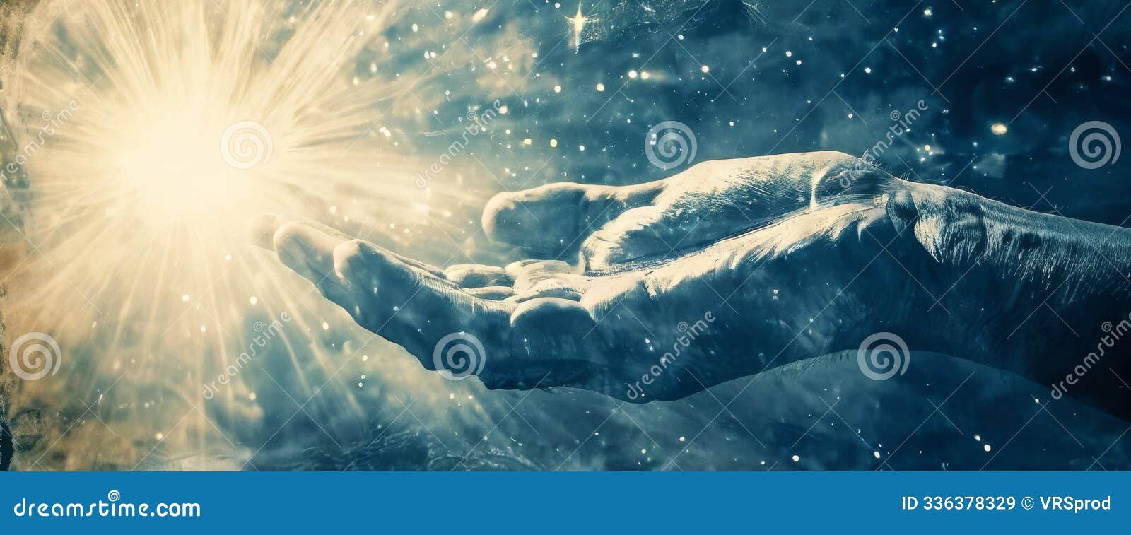 hand reaching toward radiant light in cosmic space