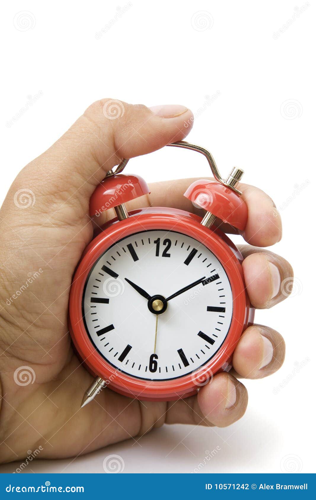 Hand and Red Alarm Clock stock photo. Image of hand, clock 10571242