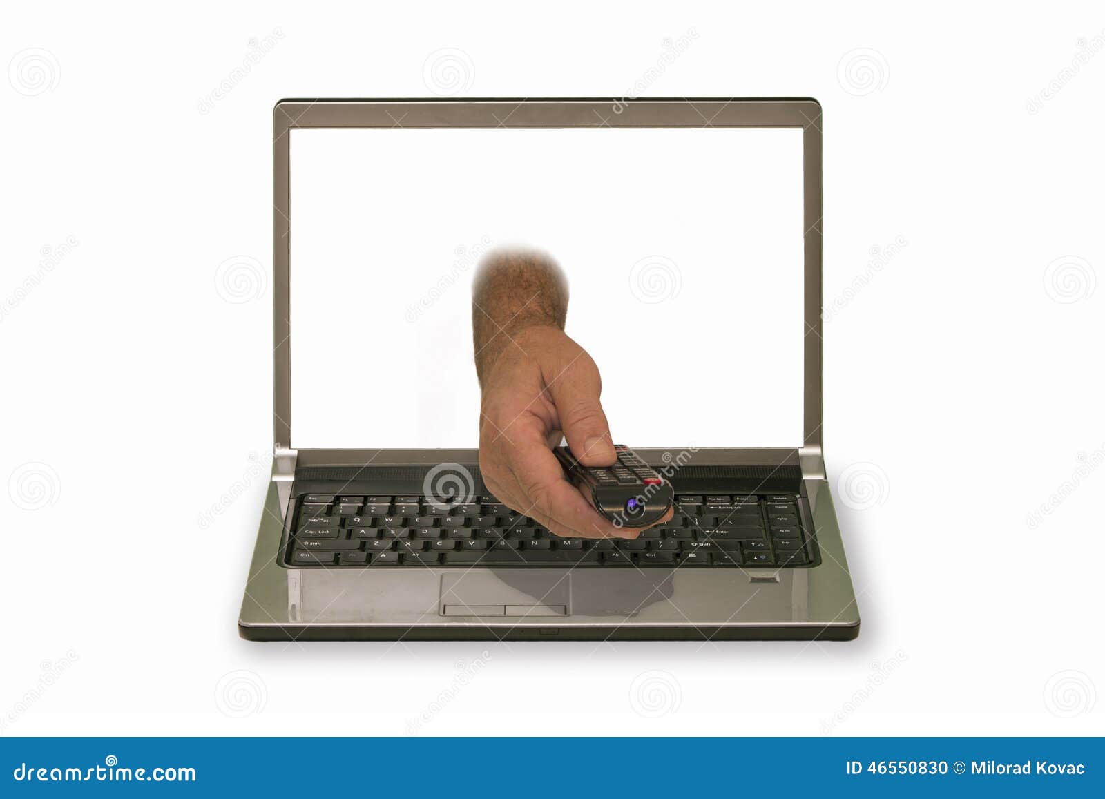 Hand with Remote Control Reaching Out of Laptop Display Stock Photo