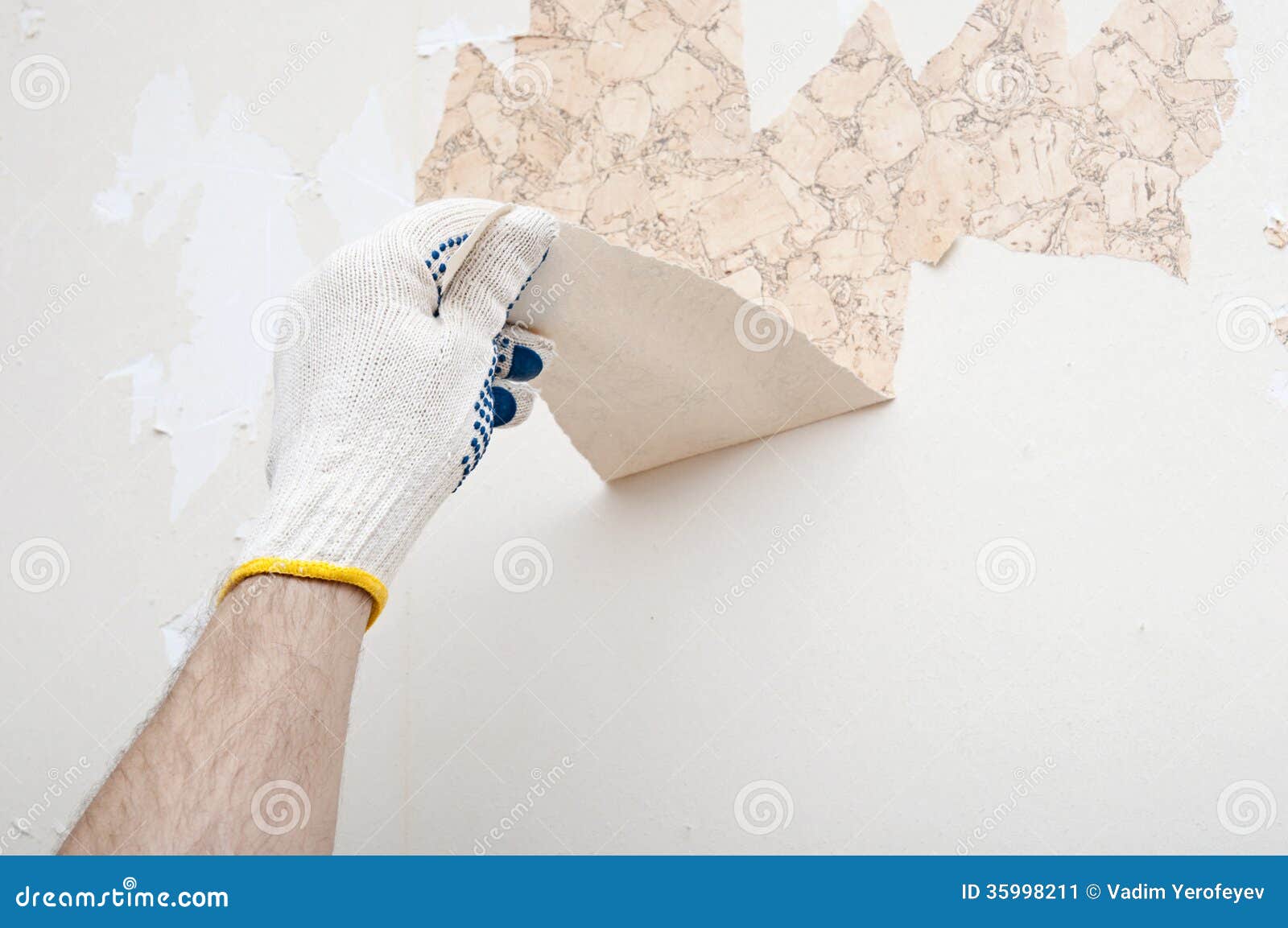 Hand removing wallpaper stock image. Image of hand, putty 35998211