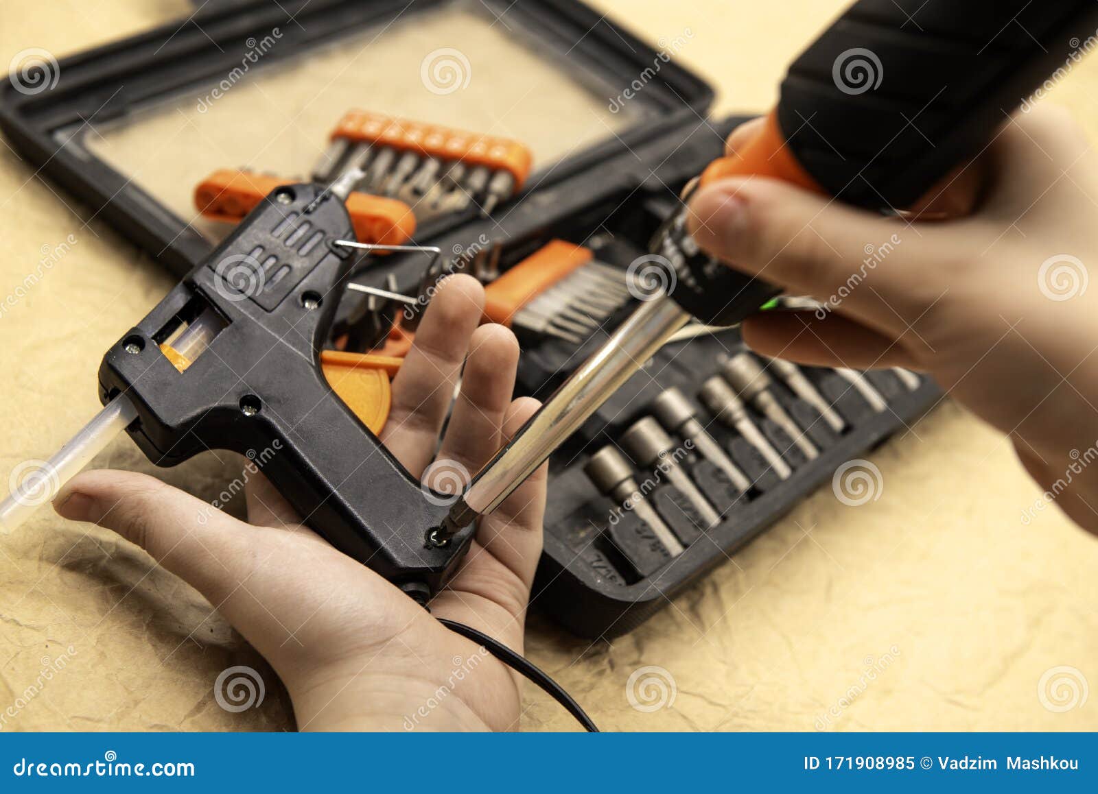 Hand Repairs Glue Gun Using Tool Stock Image Image of hold, black