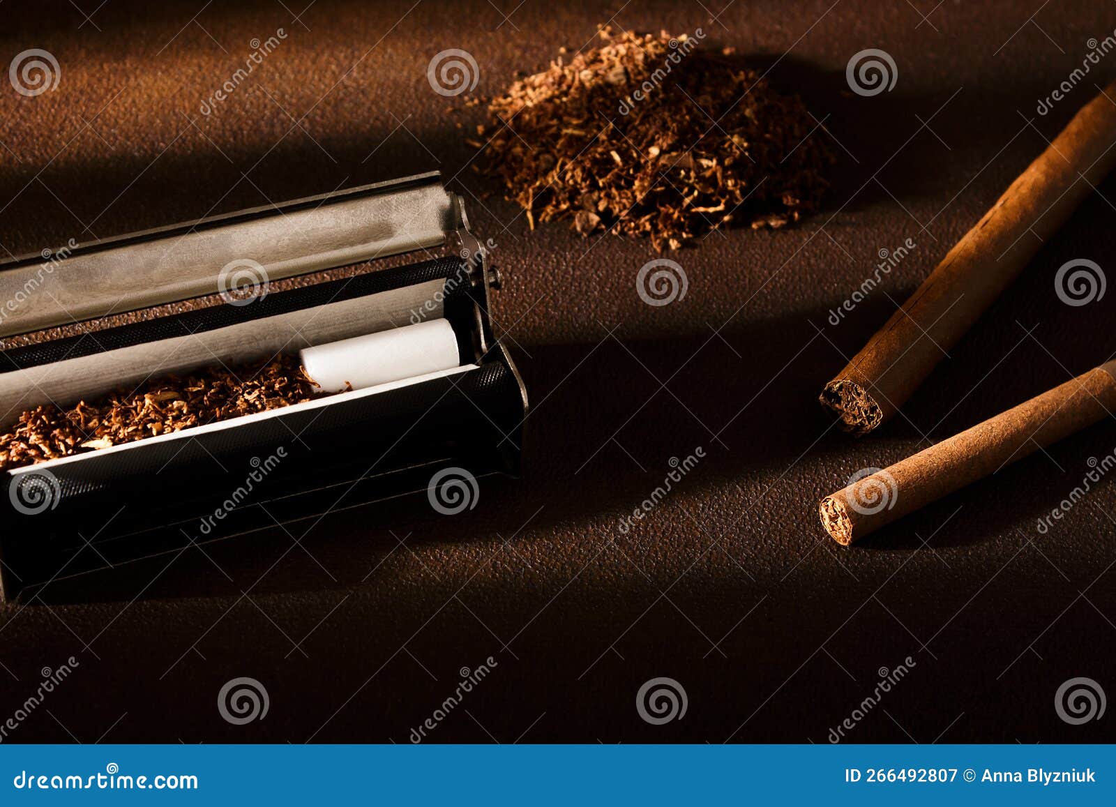 Cigarette Rolling Machine Stock Photos - Free & Royalty-Free Stock Photos  from Dreamstime