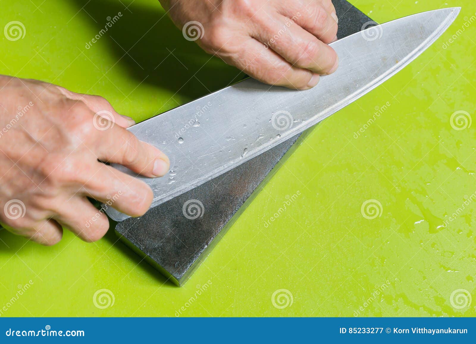 Hand Sharpening Chopper with Grindstone Stock Image Image of metal