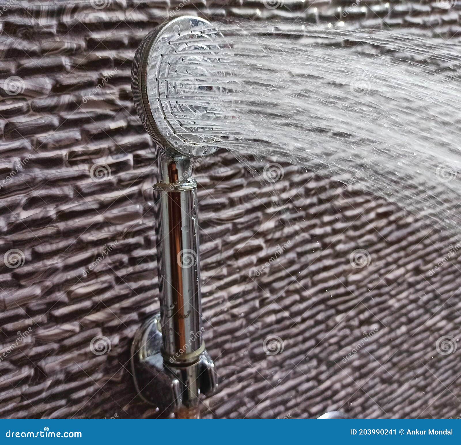 Hand Shower in bathroom stock image. Image of liquid 203990241