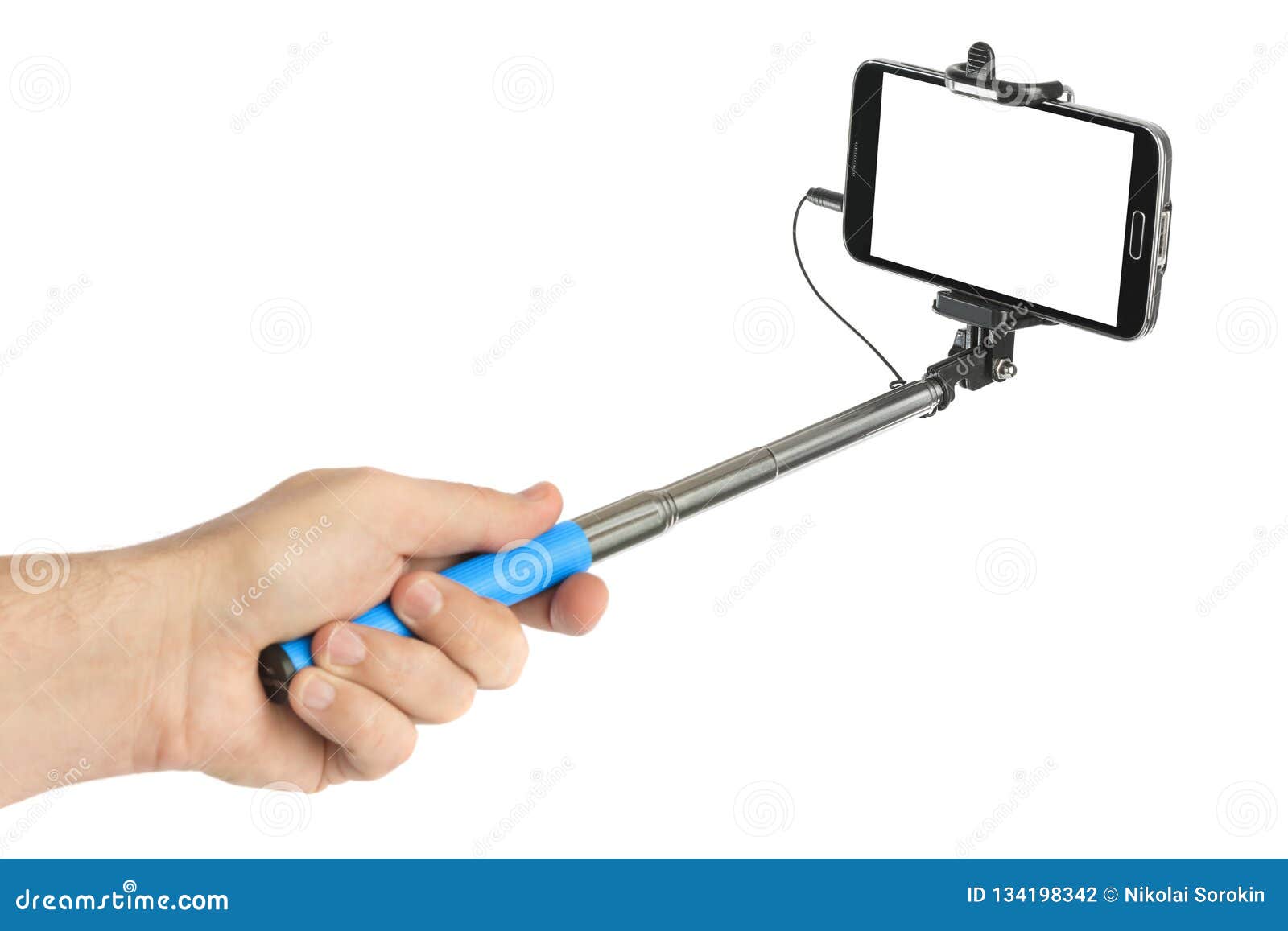 hand and smartphone with selfie stick