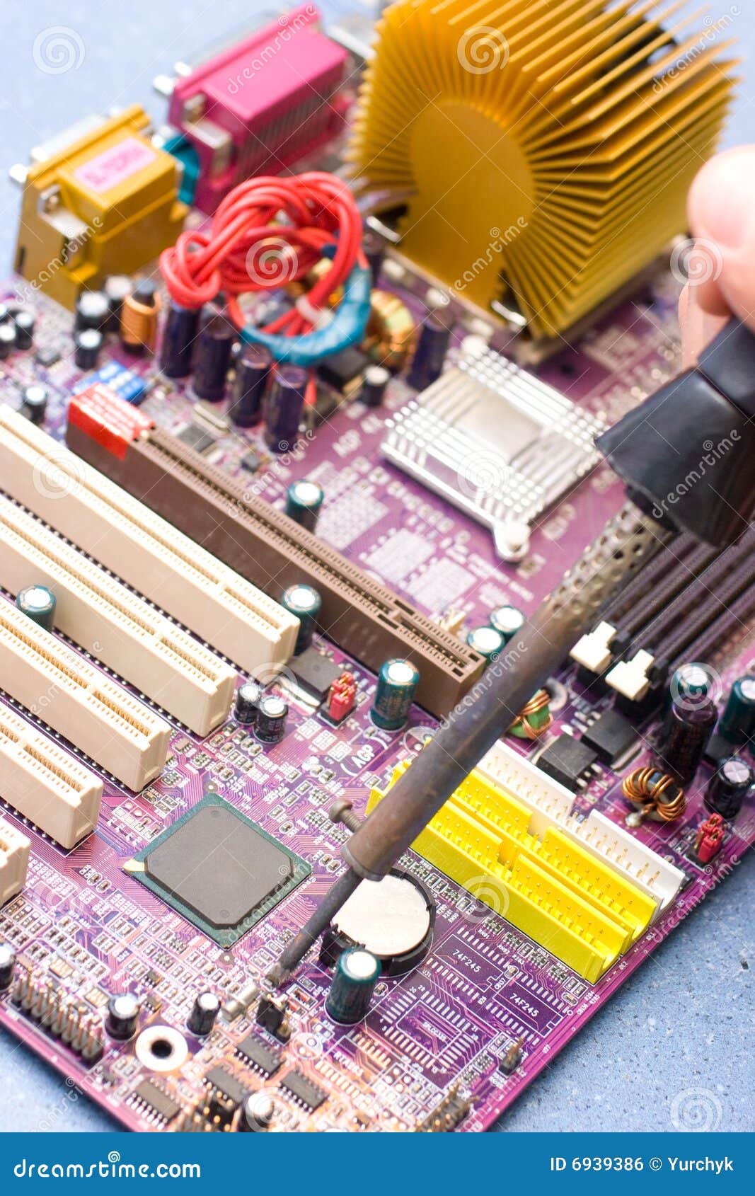 Hand with Soldering Iron Over Motherboard Stock Photo Image of