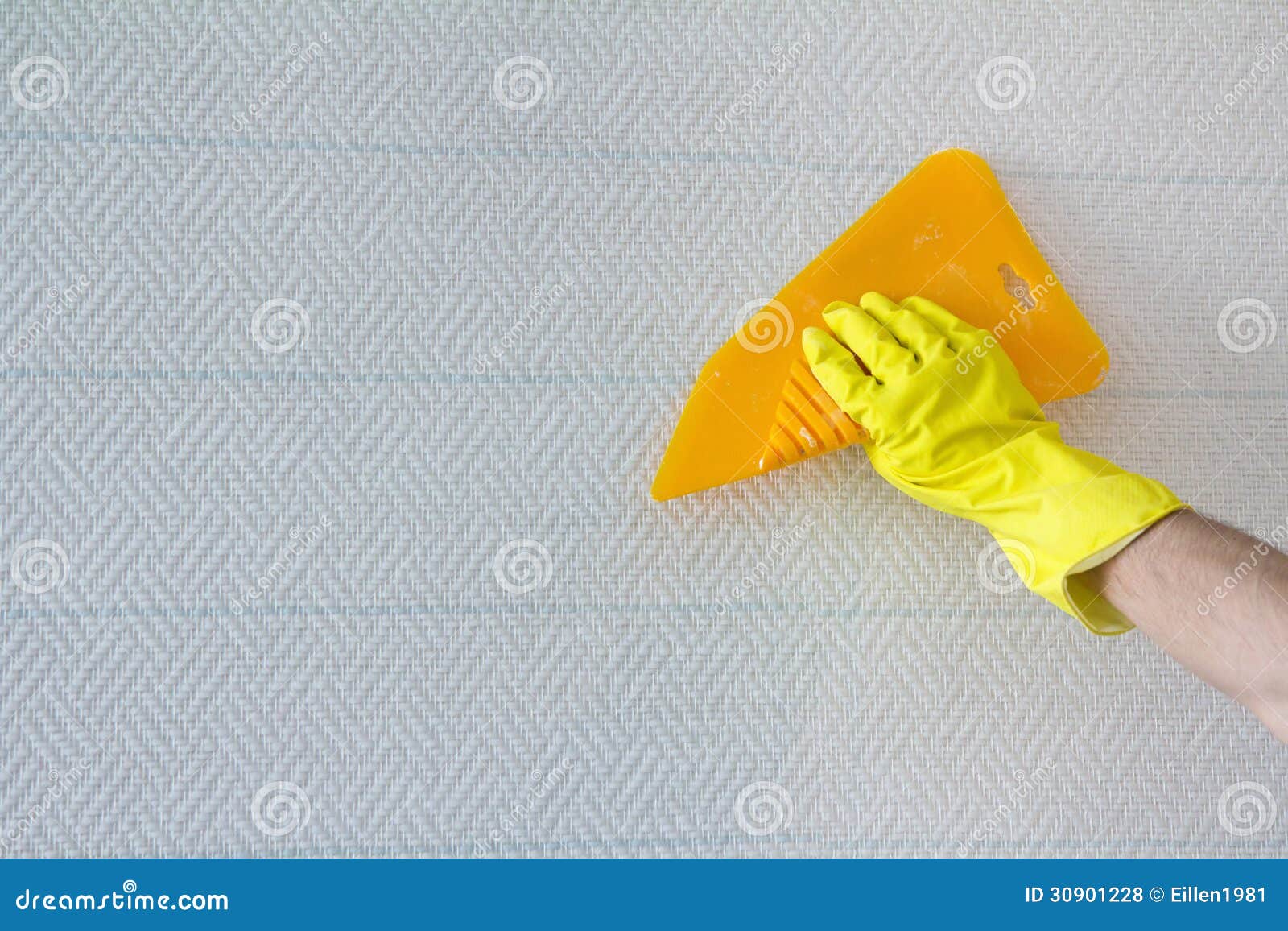 Hand with Spatula Smoothing Wallpaper Stock Photo Image of people