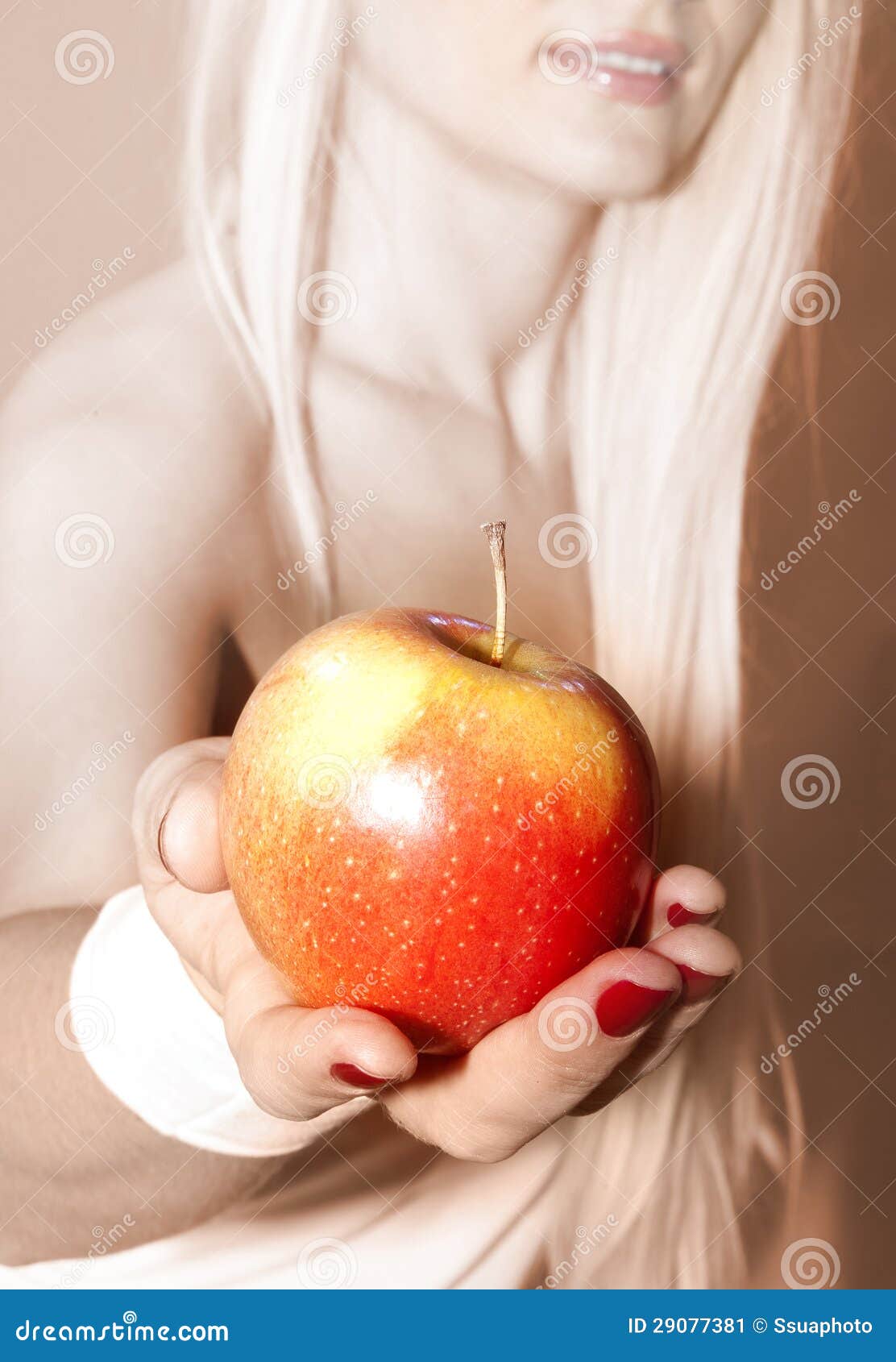 hand that suggests to take apple